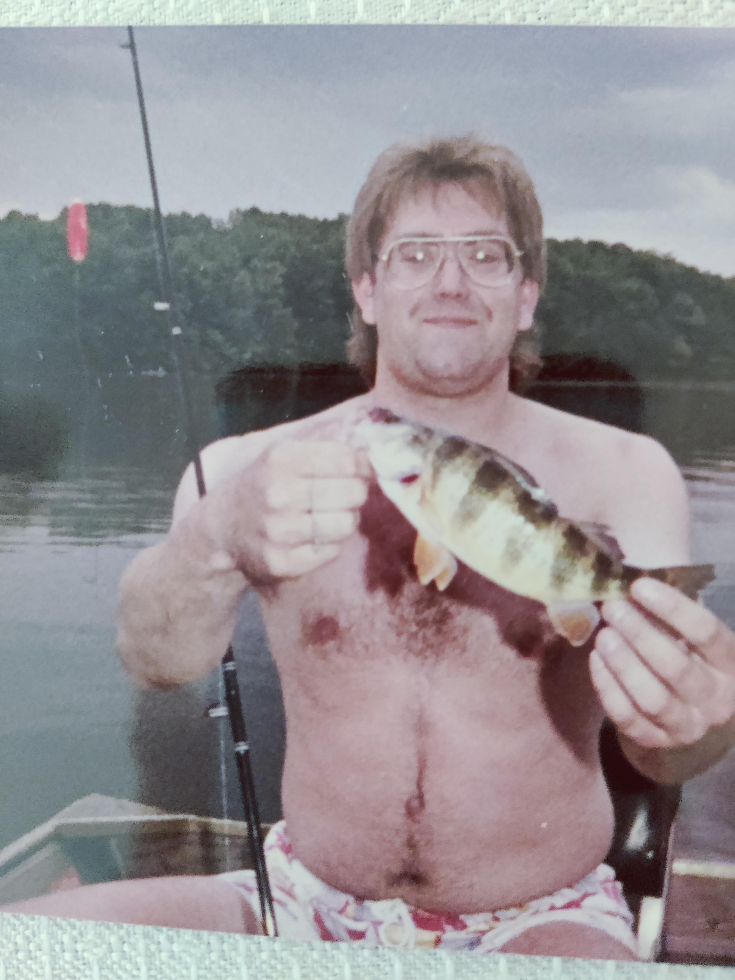 A man holding a fish