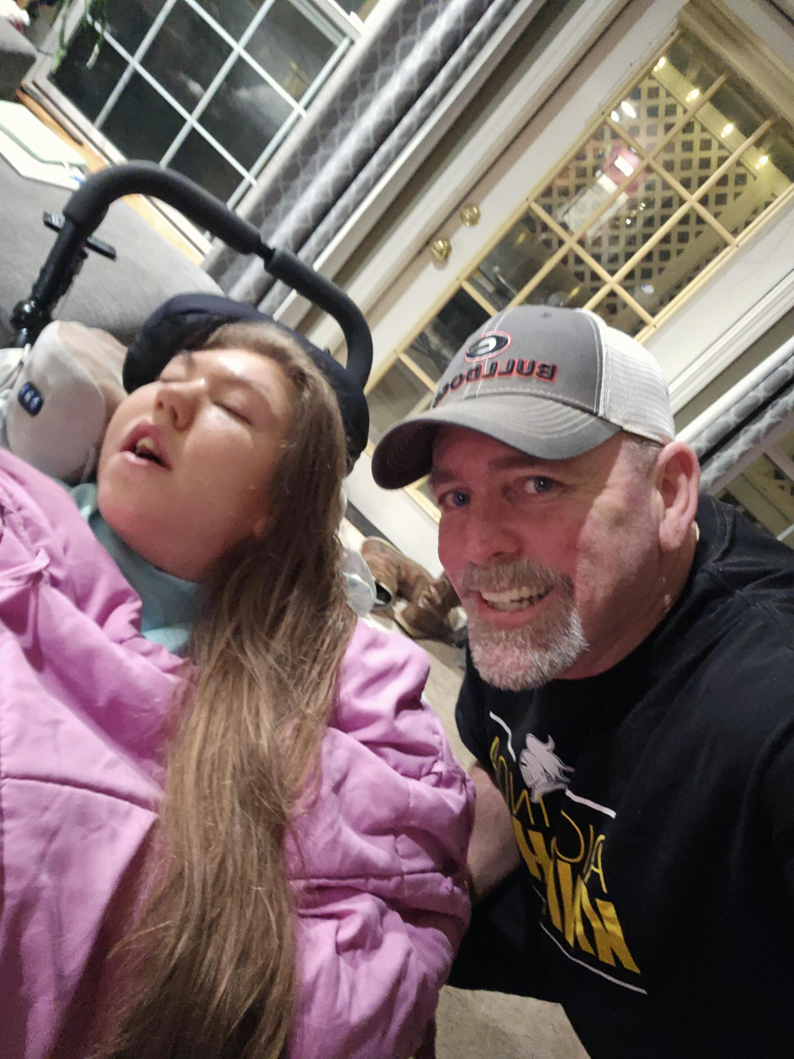 A man and a girl taking a selfie