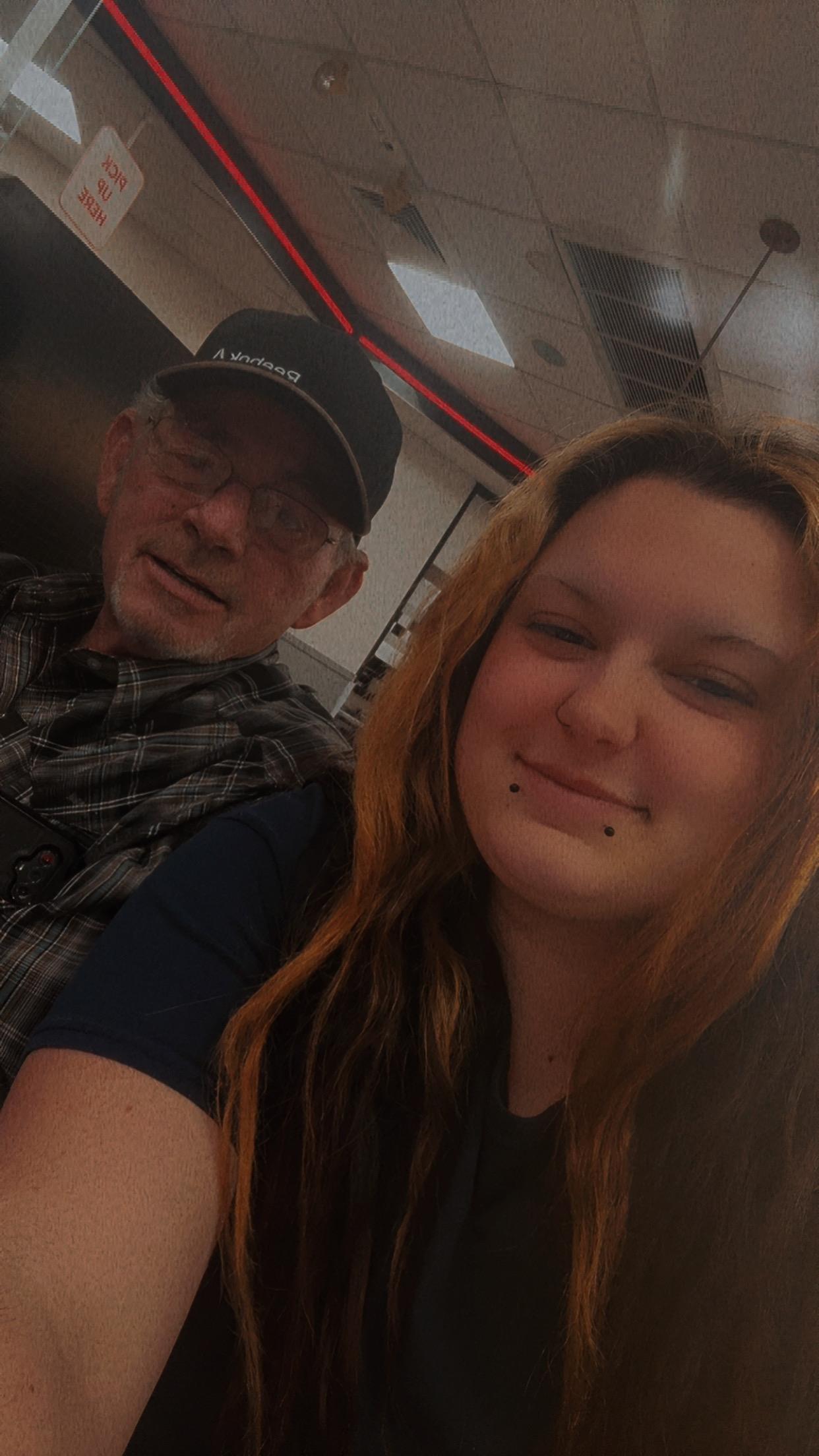 A man and woman taking a selfie