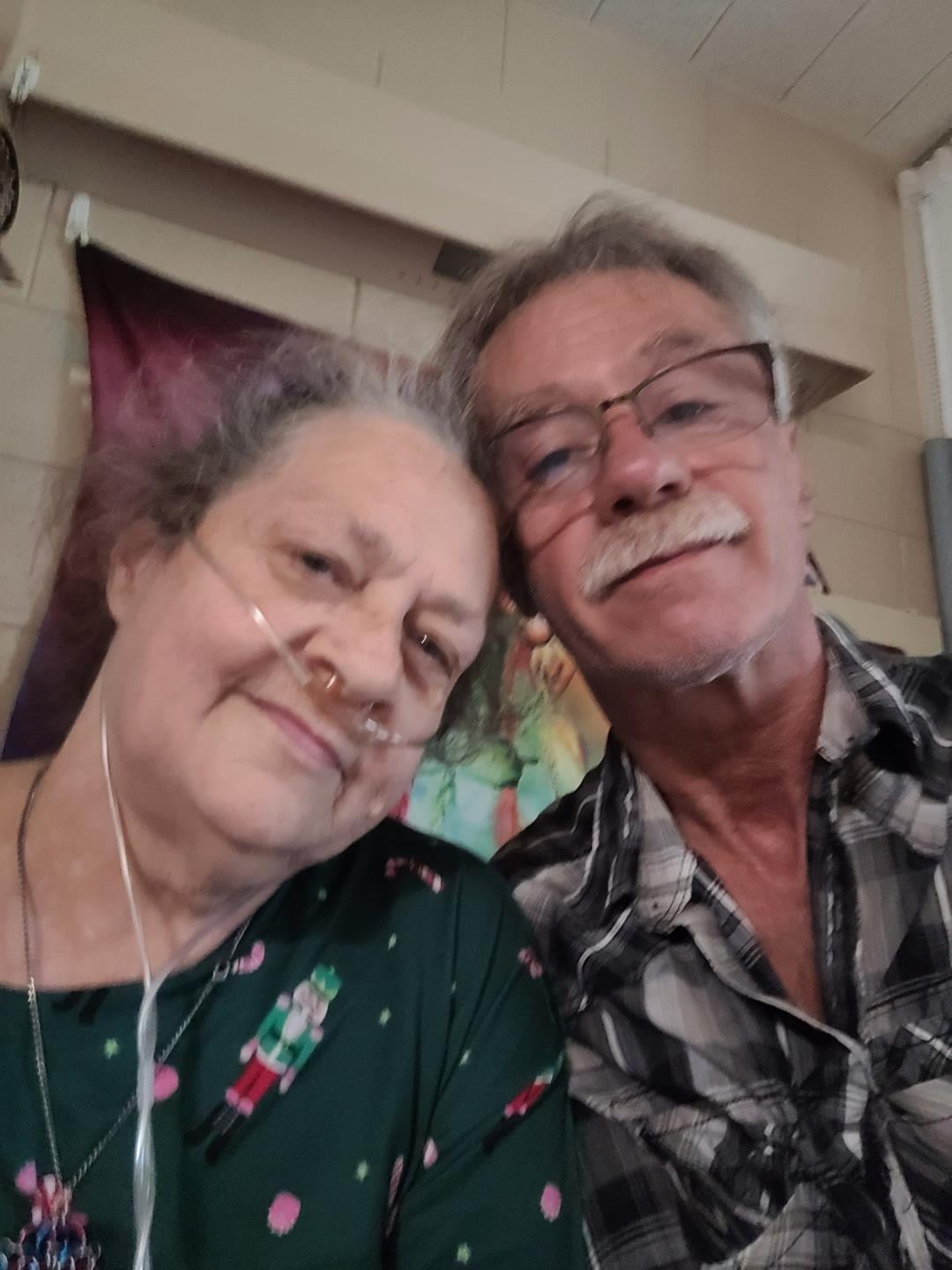 A man and woman taking a selfie