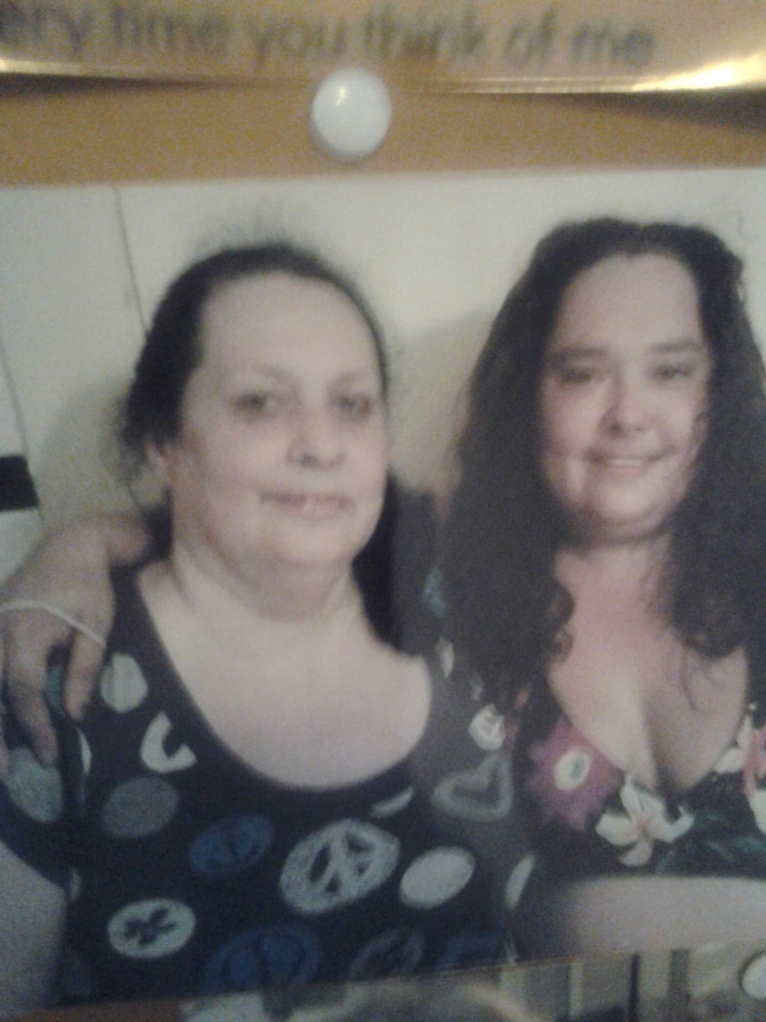 Two women posing for a picture