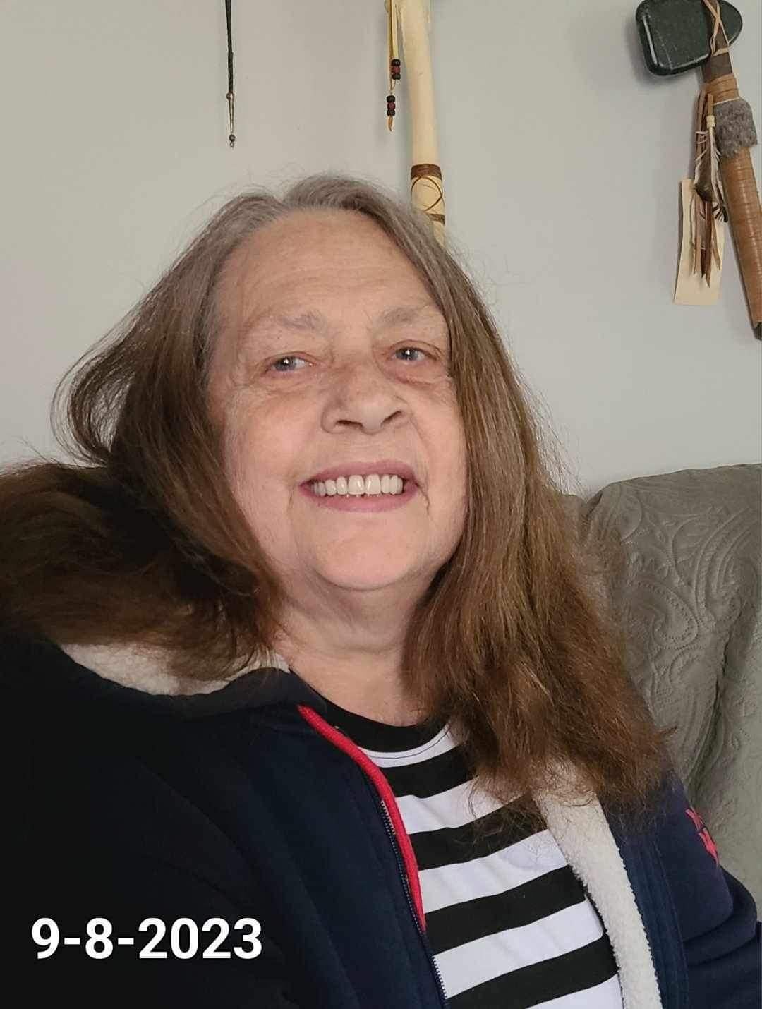 A woman smiling at the camera