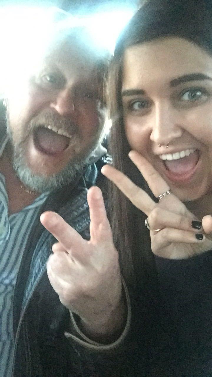 A man and woman taking a selfie