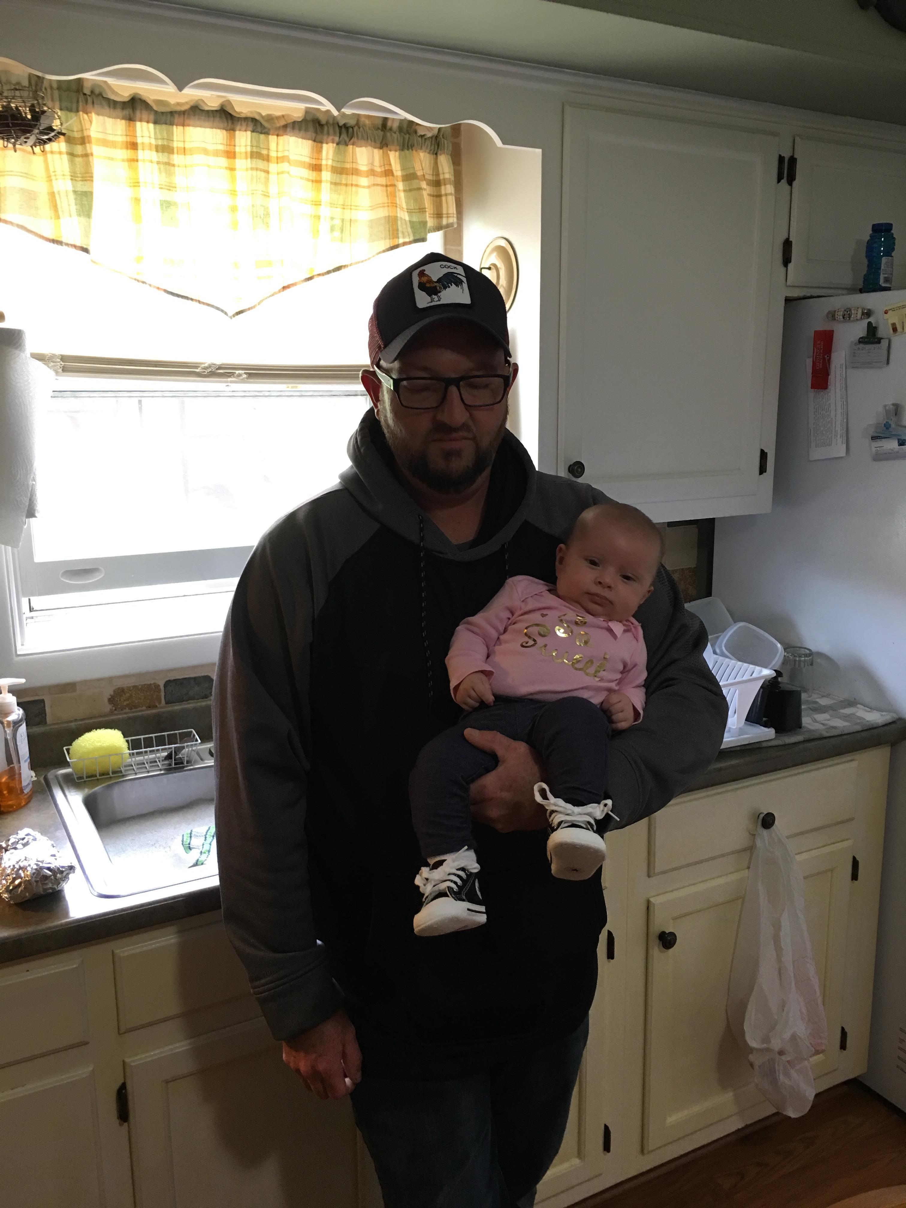 A man holding a baby