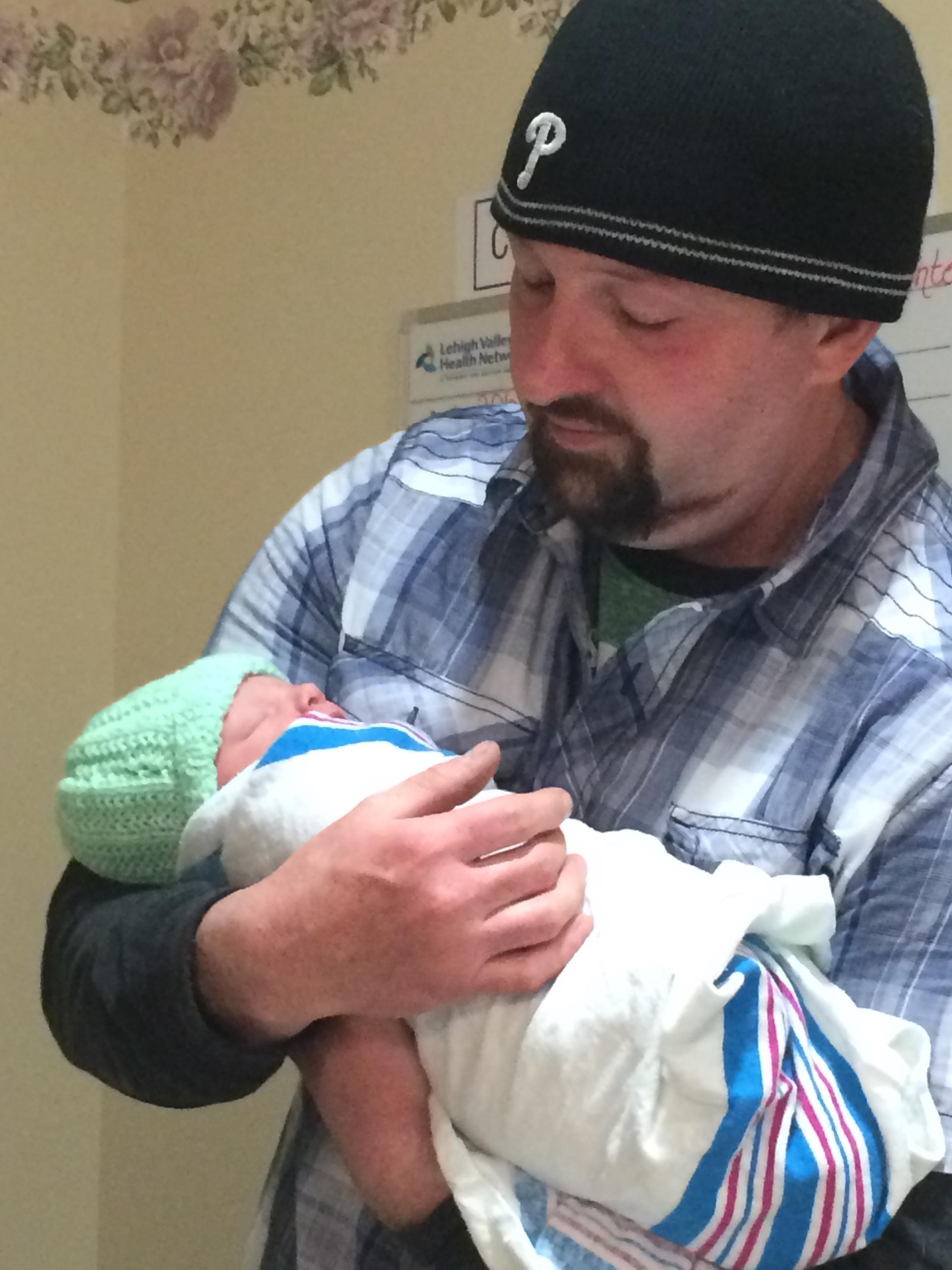 A man holding a baby