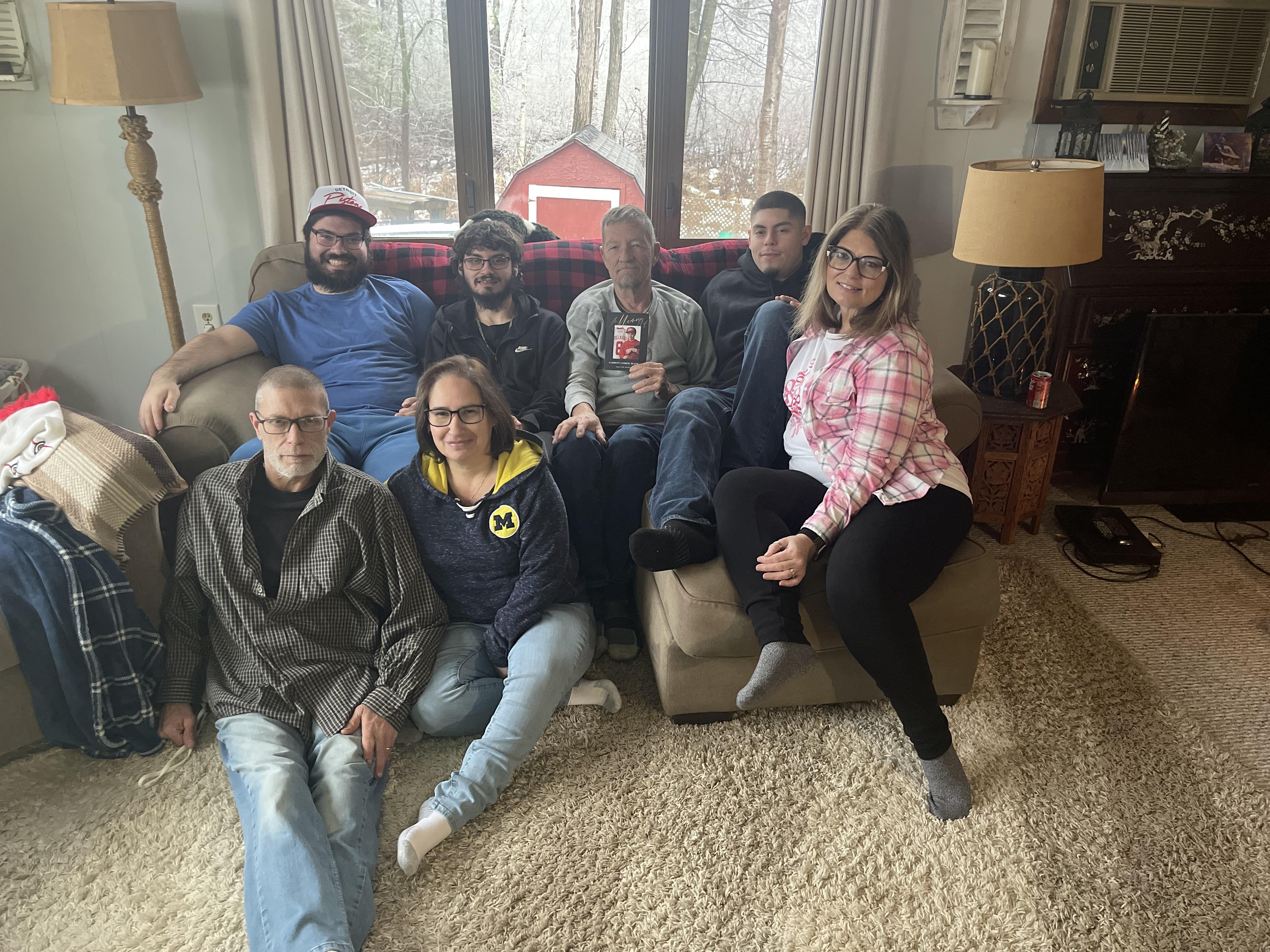 A group of people sitting on a couch