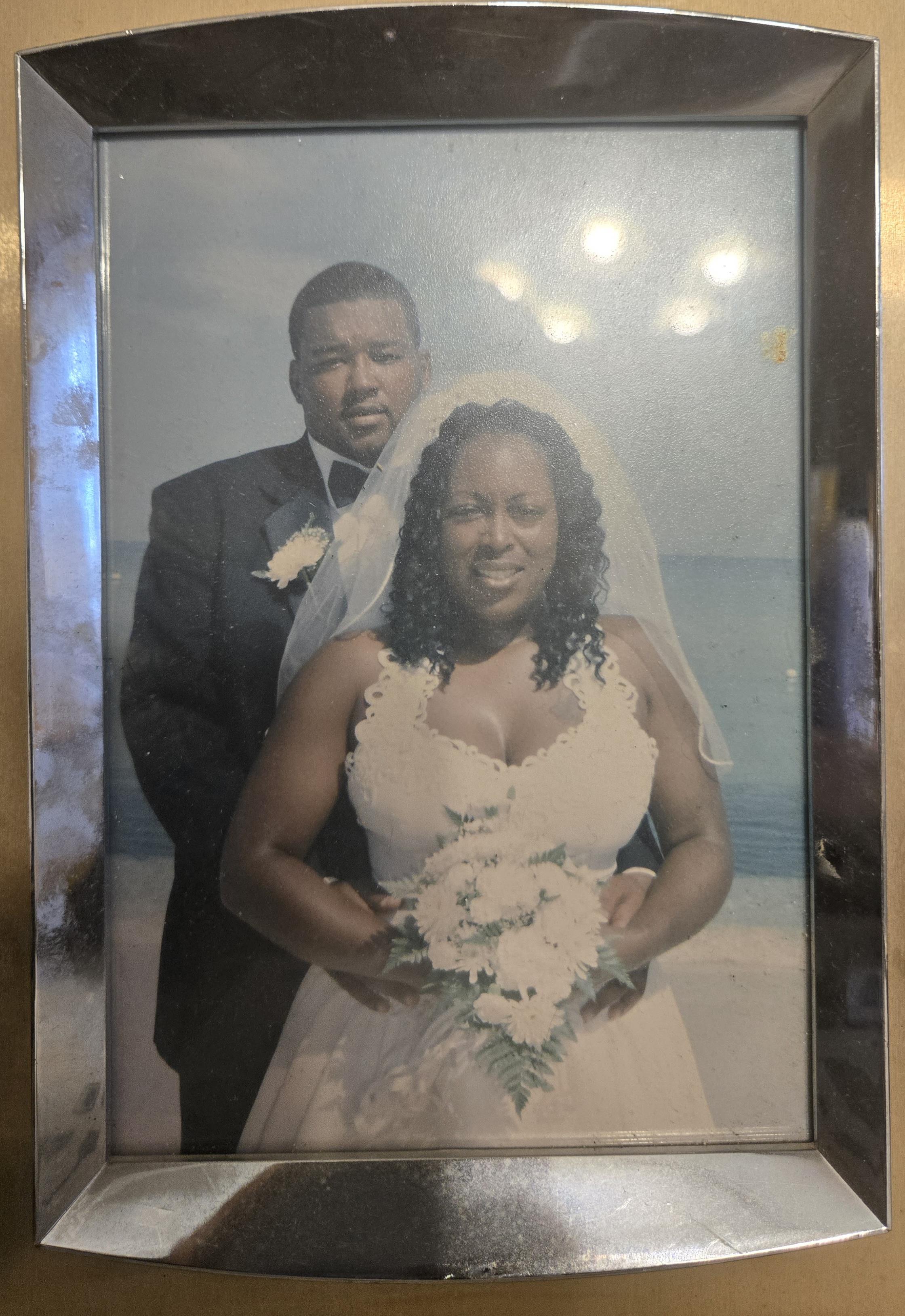A man and woman in a picture frame