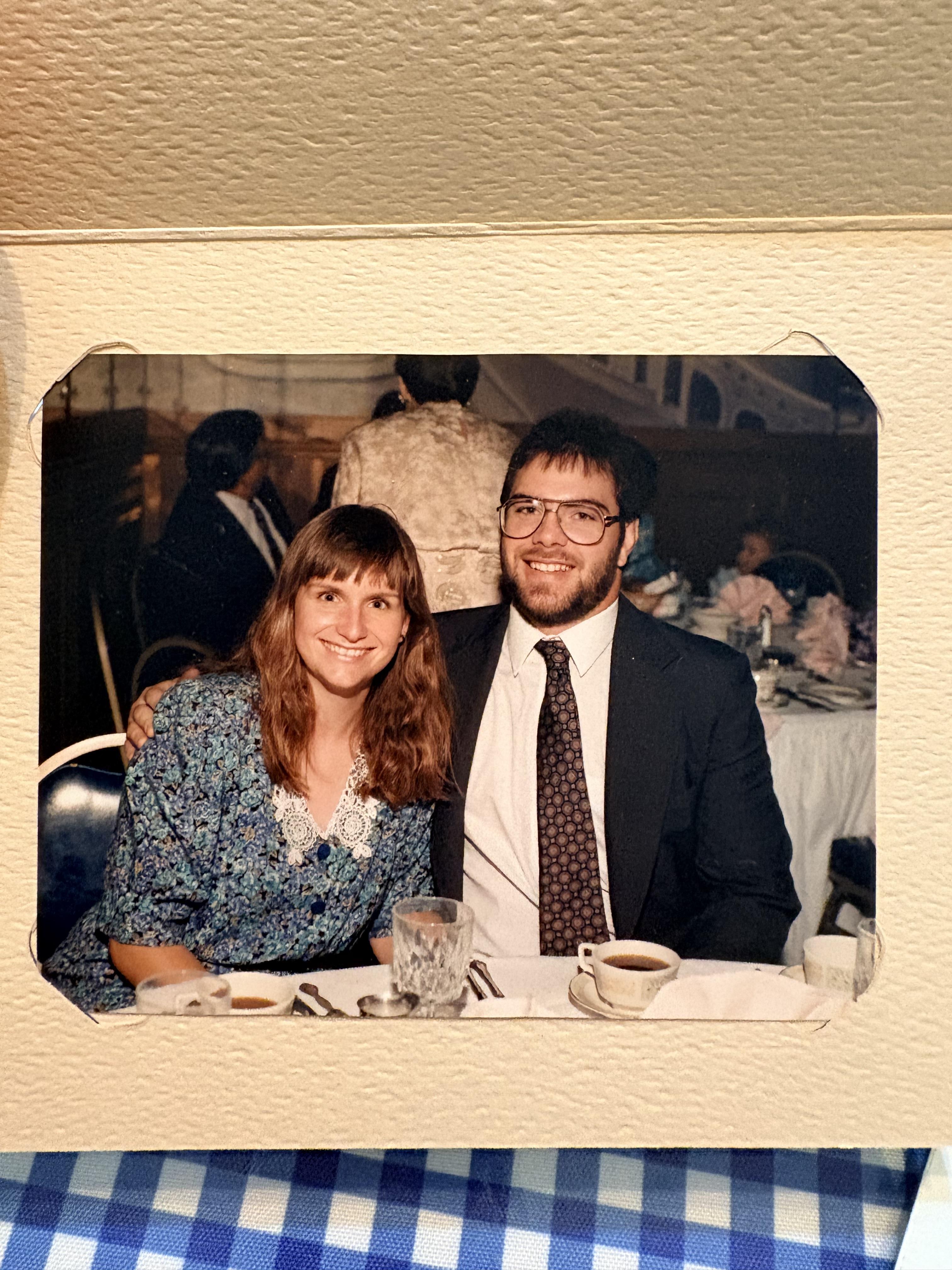 A man and woman sitting at a table