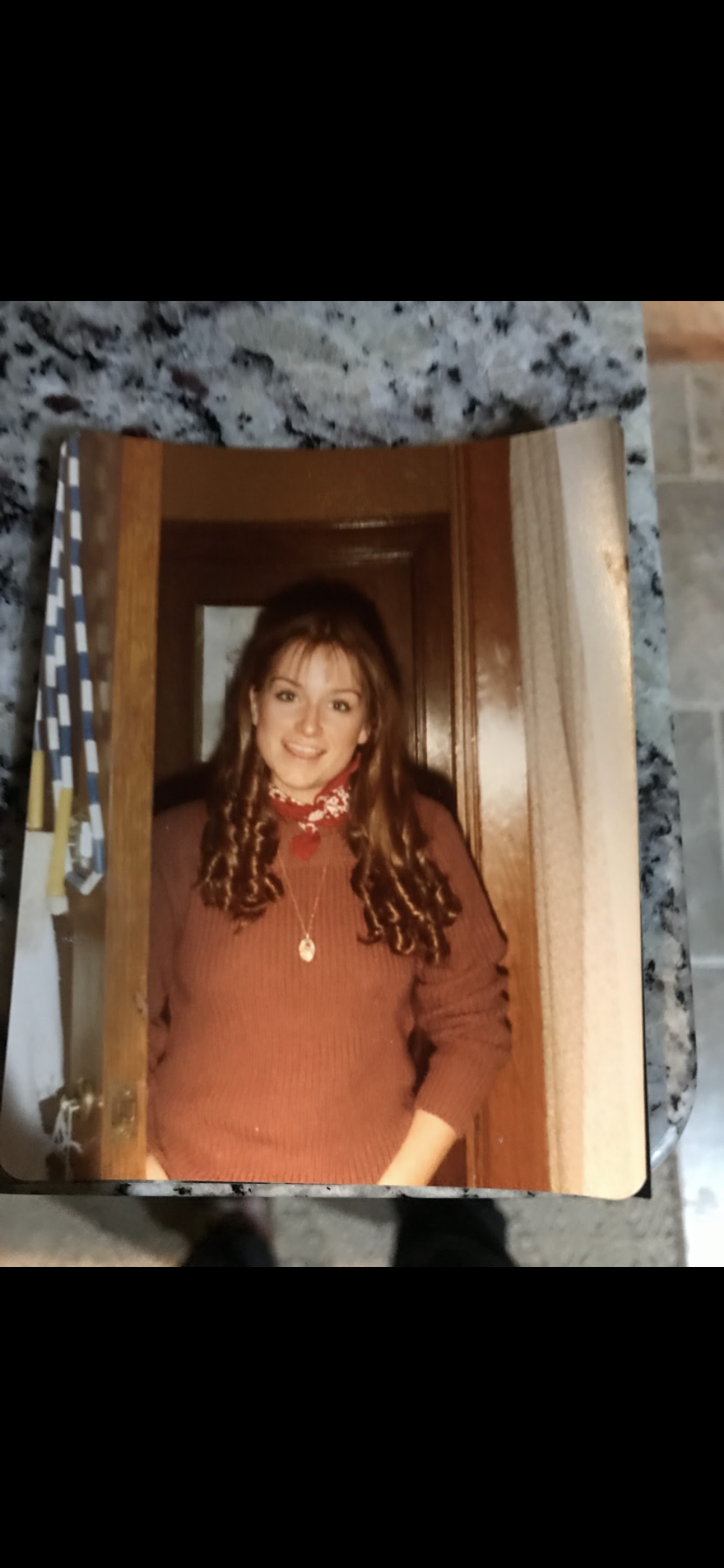 A woman smiling at camera