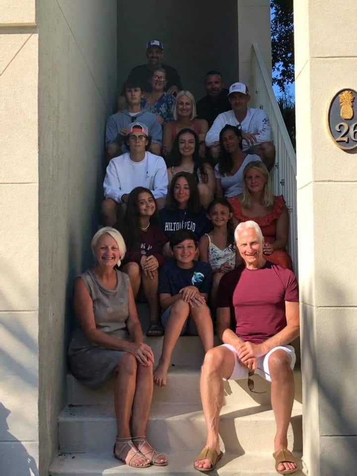 A group of people sitting on stairs