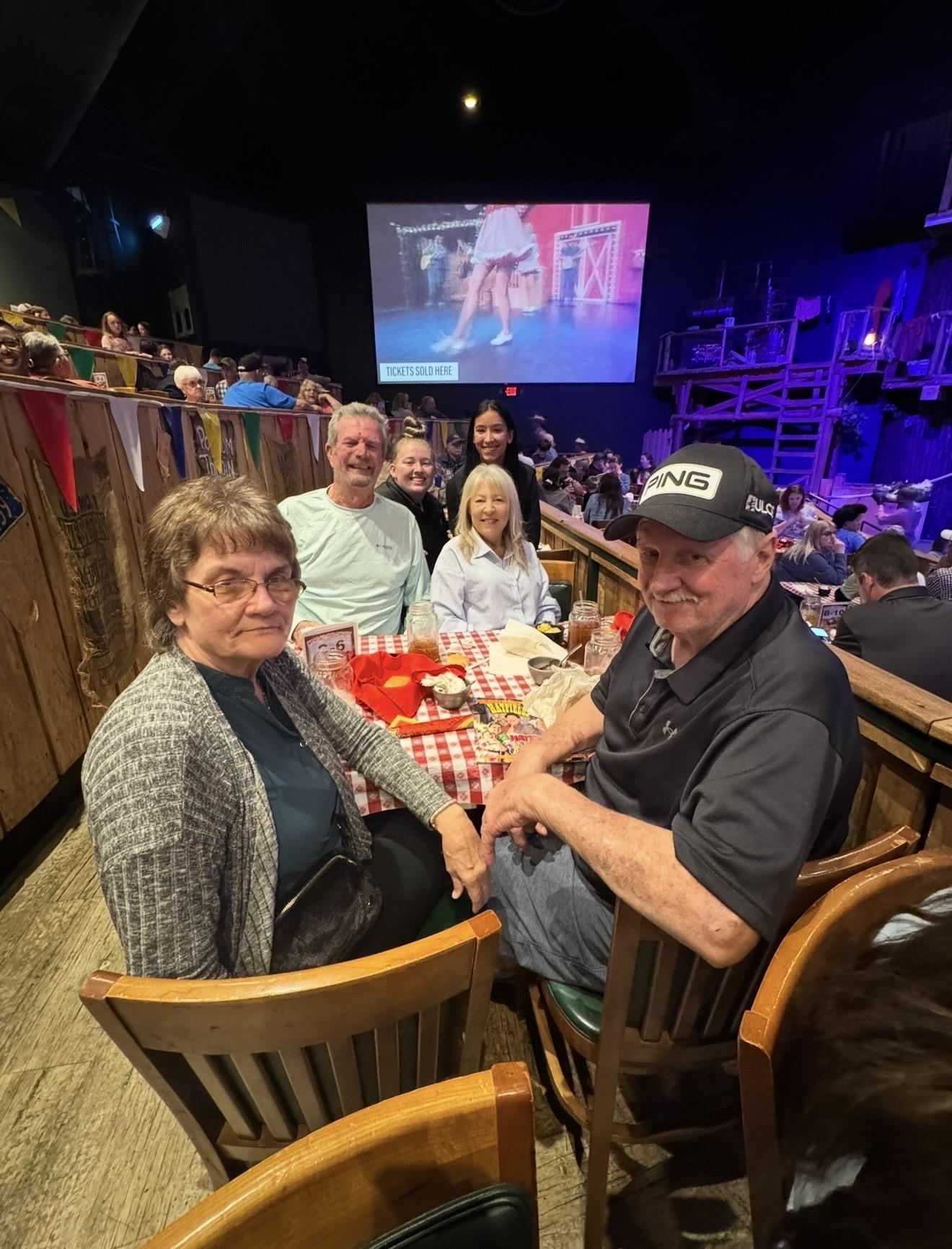 A group of people sitting at a table