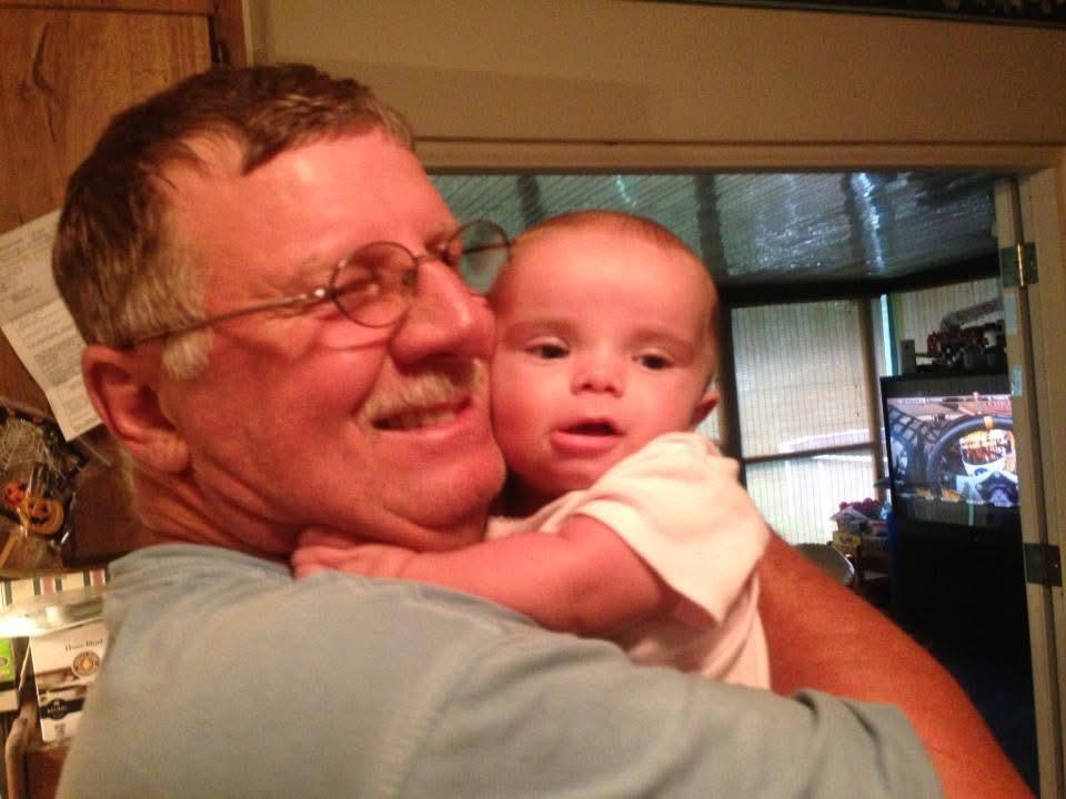 A man holding a baby