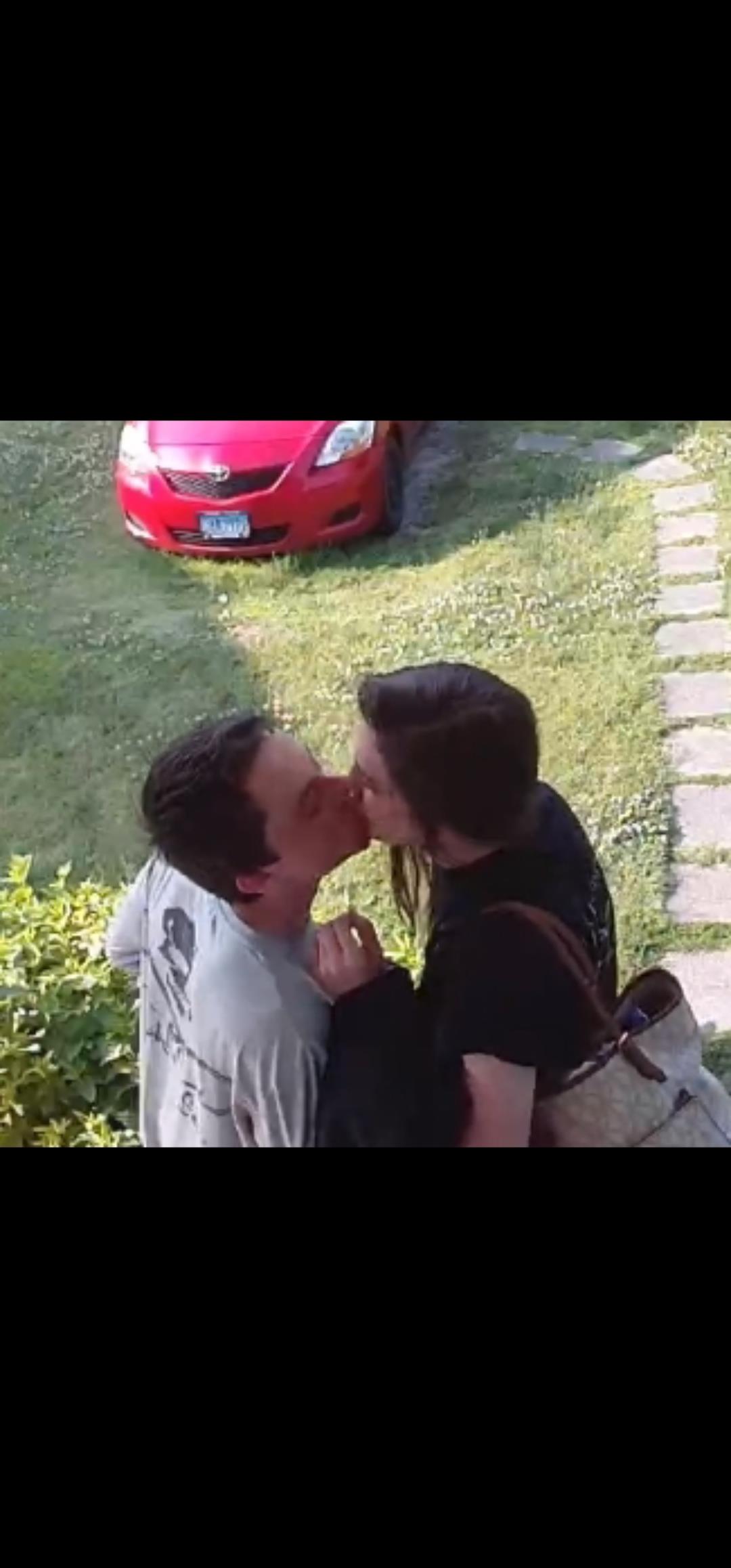 A man and woman kissing