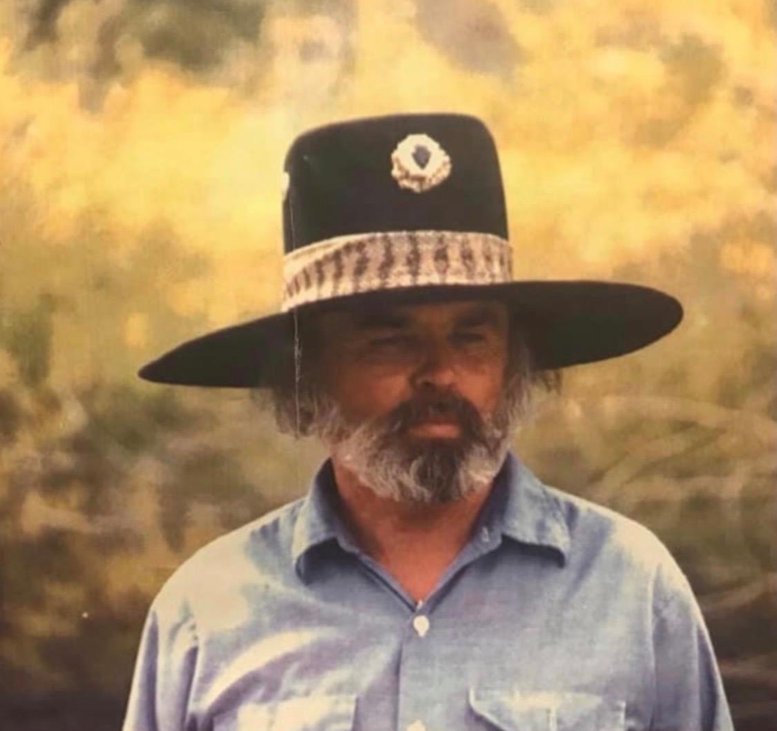 A man with a beard wearing a hat