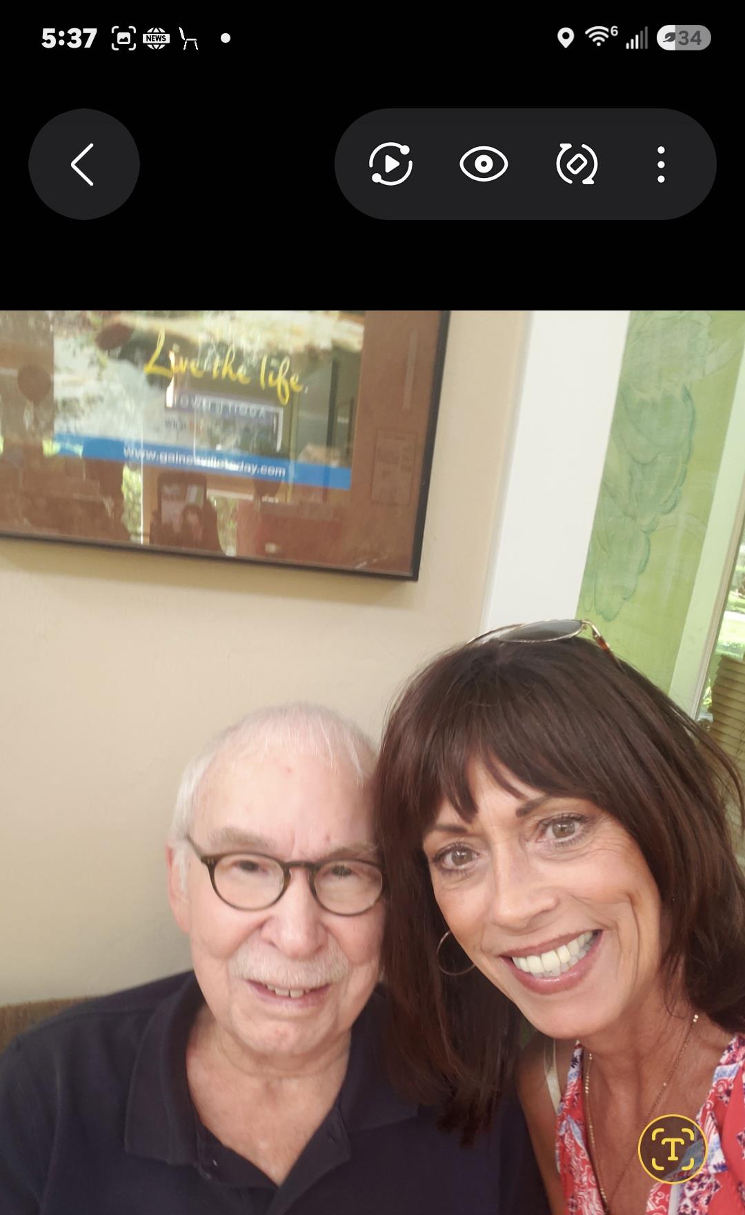 A man and woman taking a selfie