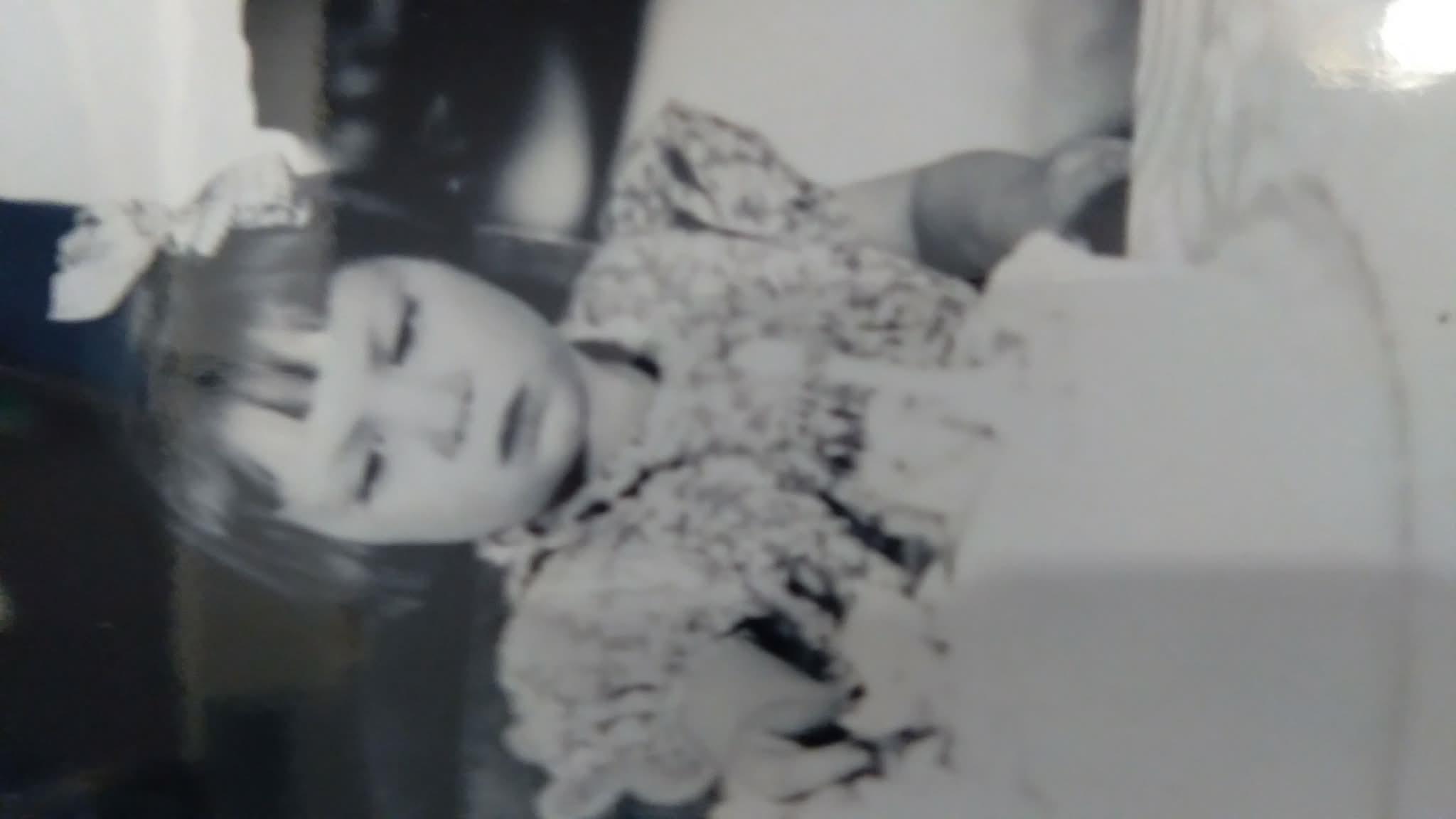 A black and white photo of a woman