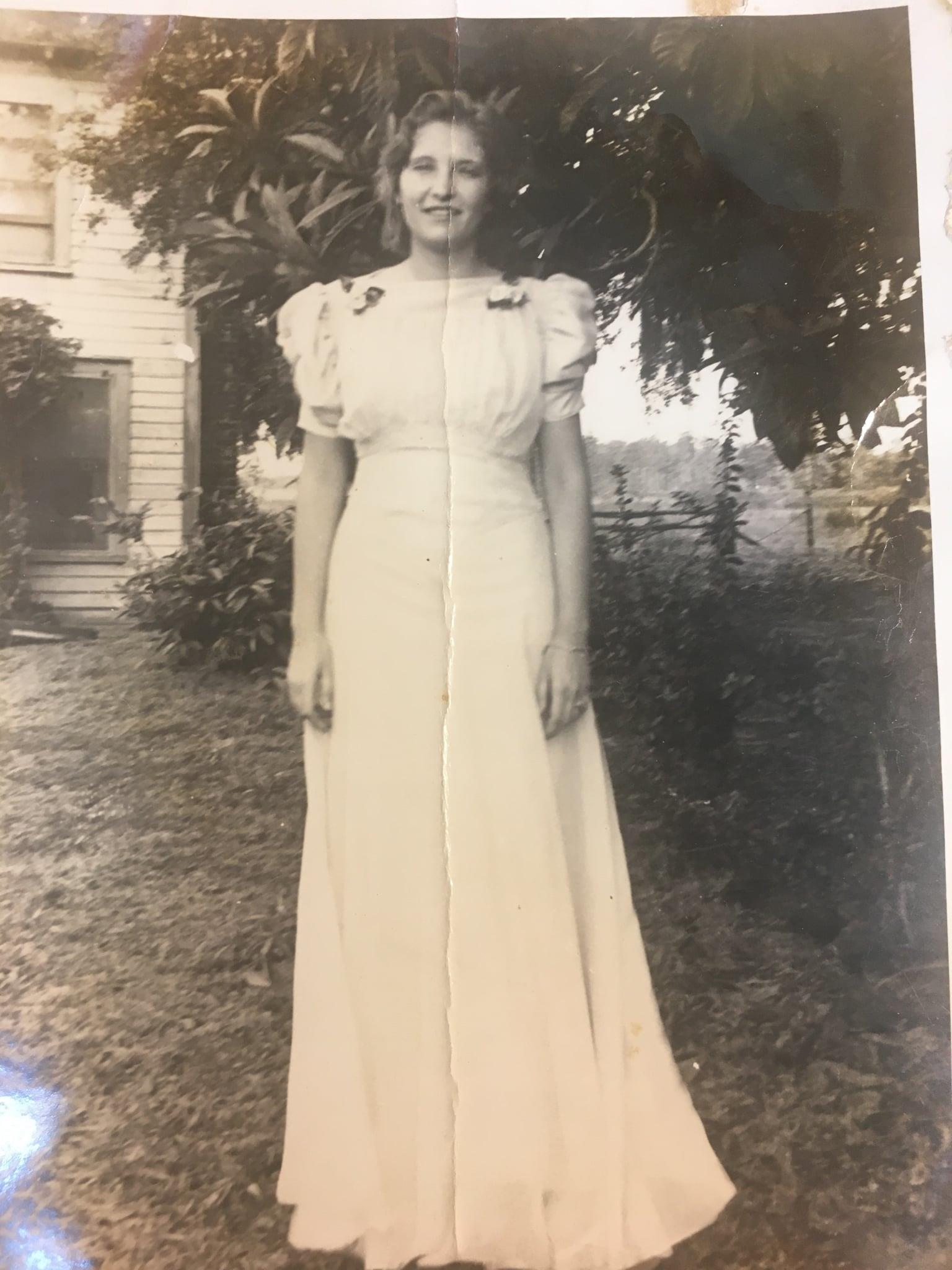 A woman in a long white dress