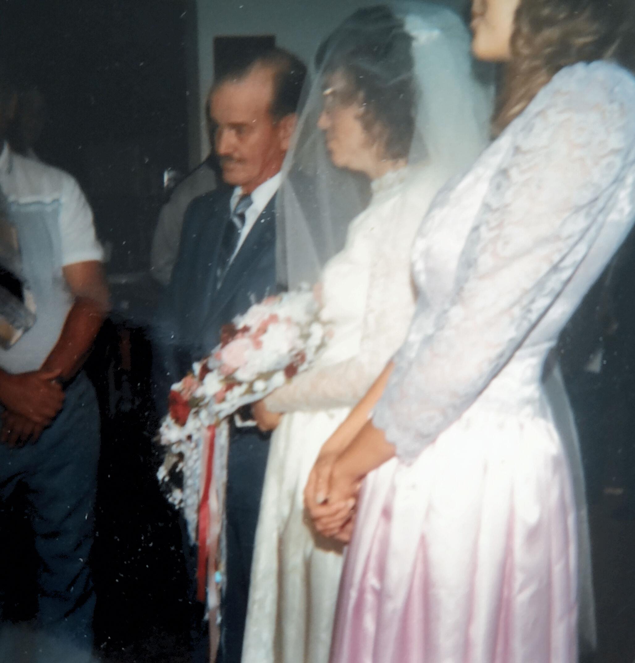 A group of people in wedding attire