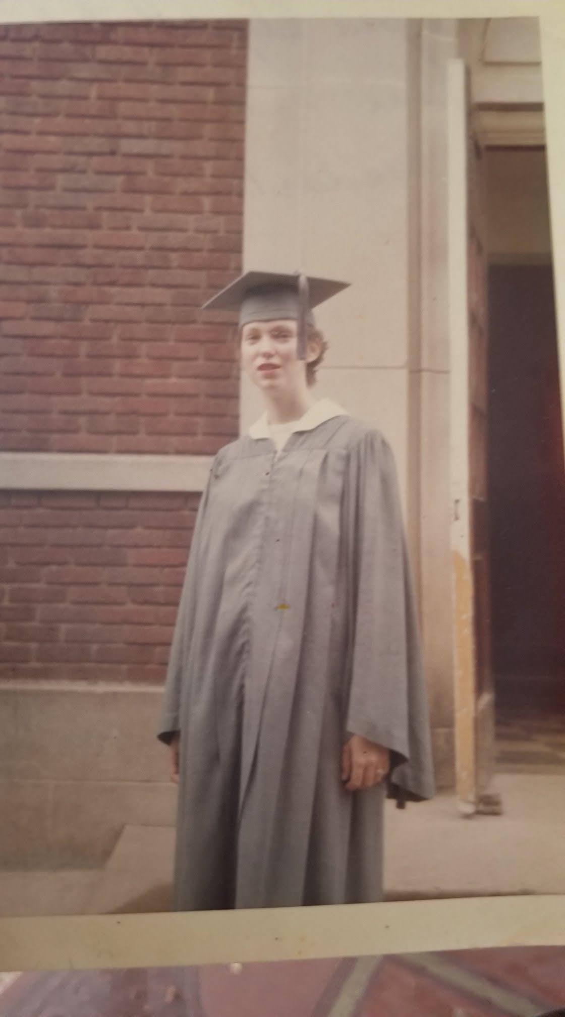A woman in a graduation gown