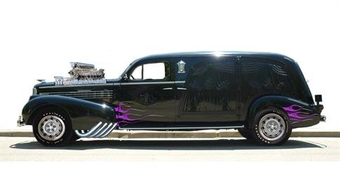 A black car with a chrome engine