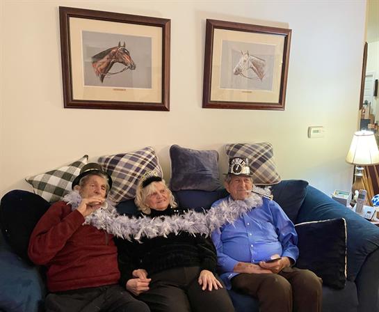 Tom and Barbara Bertino with Angie Draper's gift of Art to them. Saratoga Springs NY