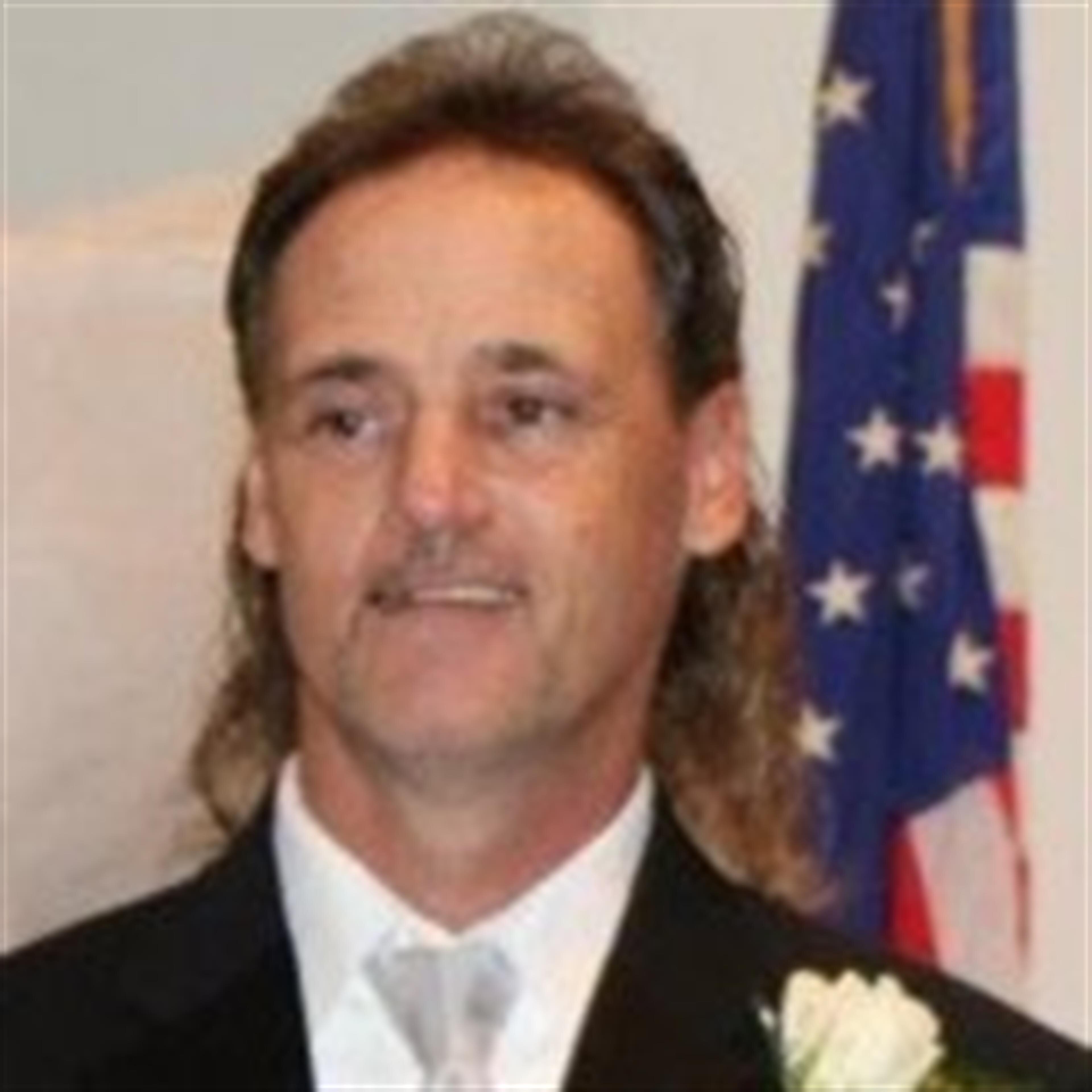 Mr. Robert L. Schumaker