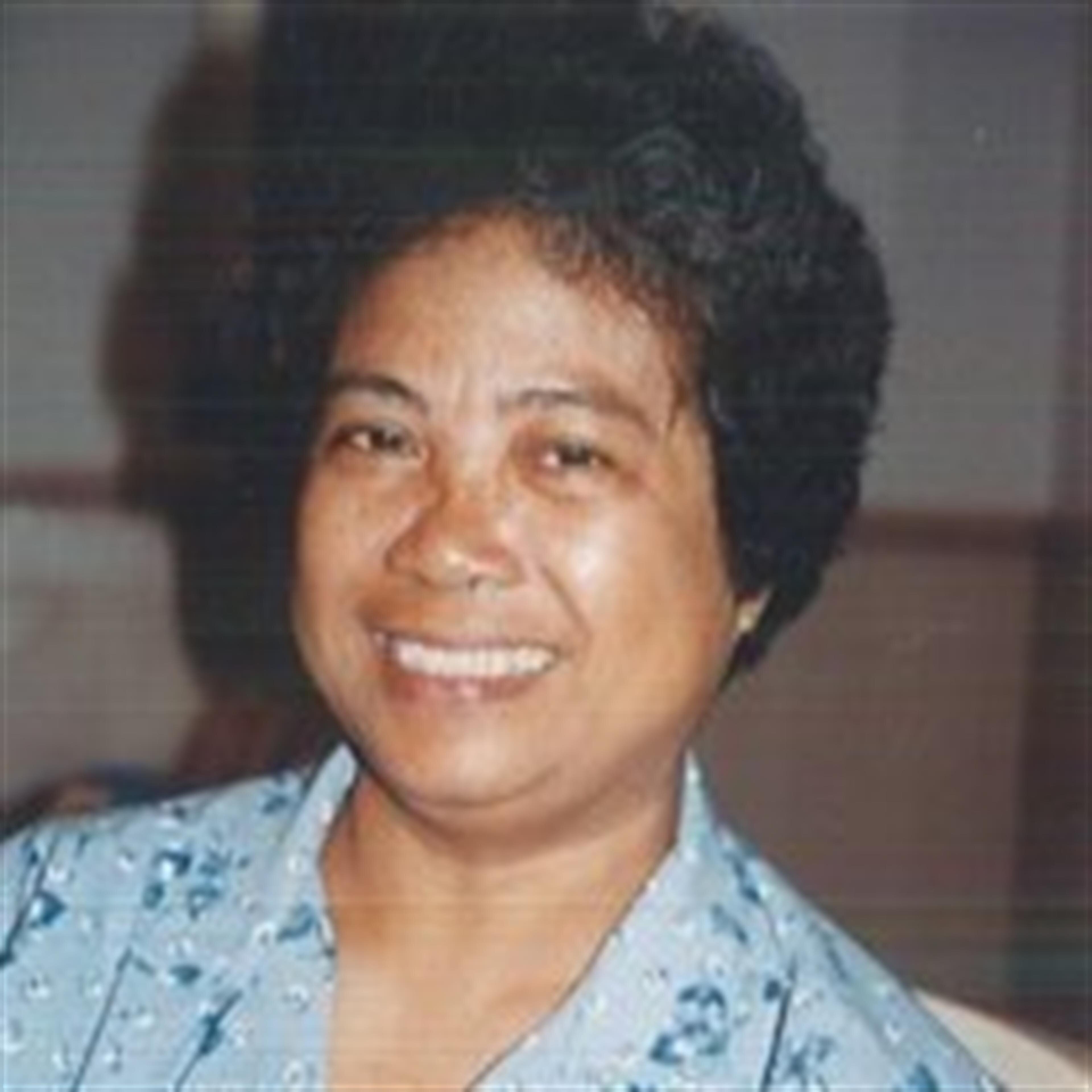 Corazon "Cora" Flores  Villasista