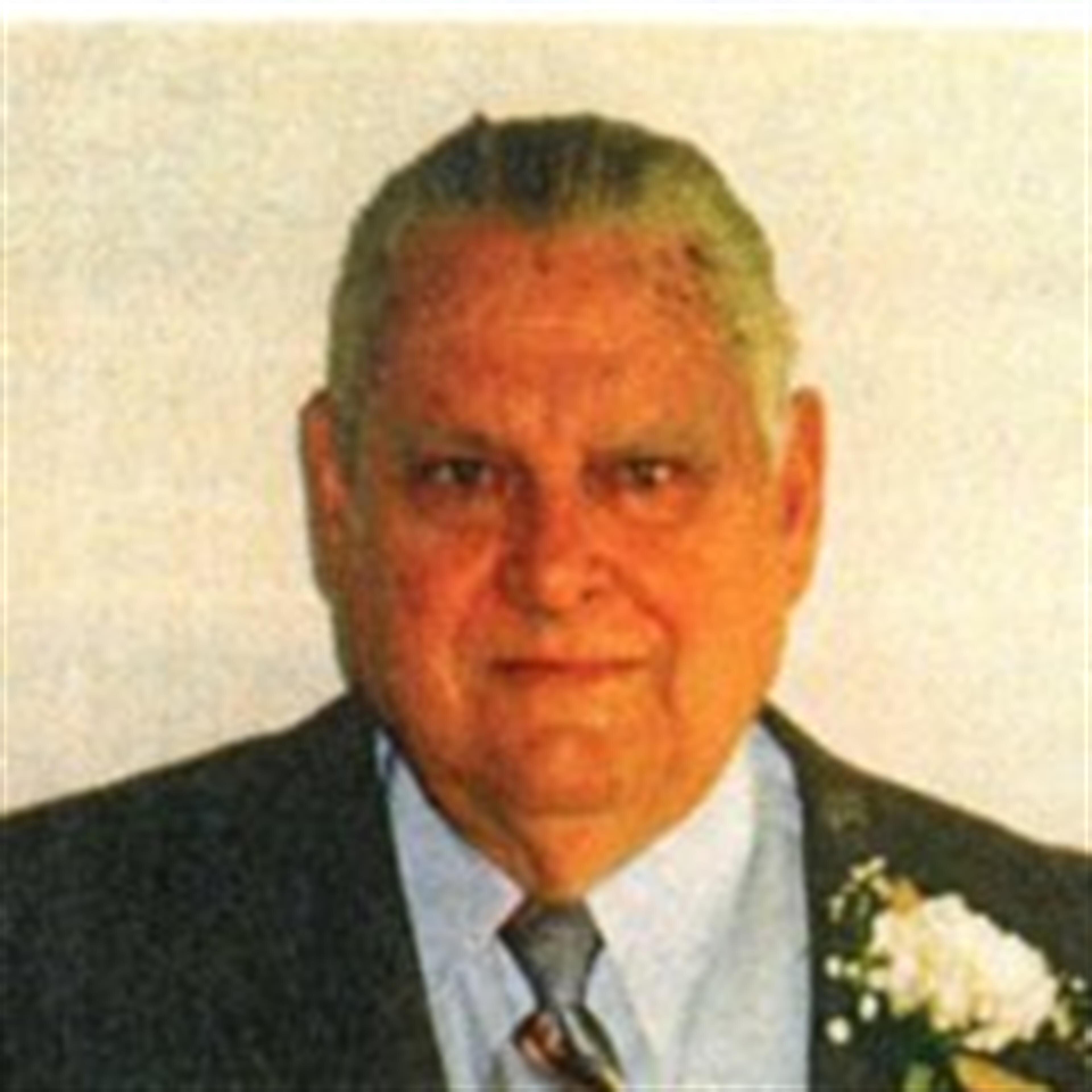 SAMUEL L. COLLINS
