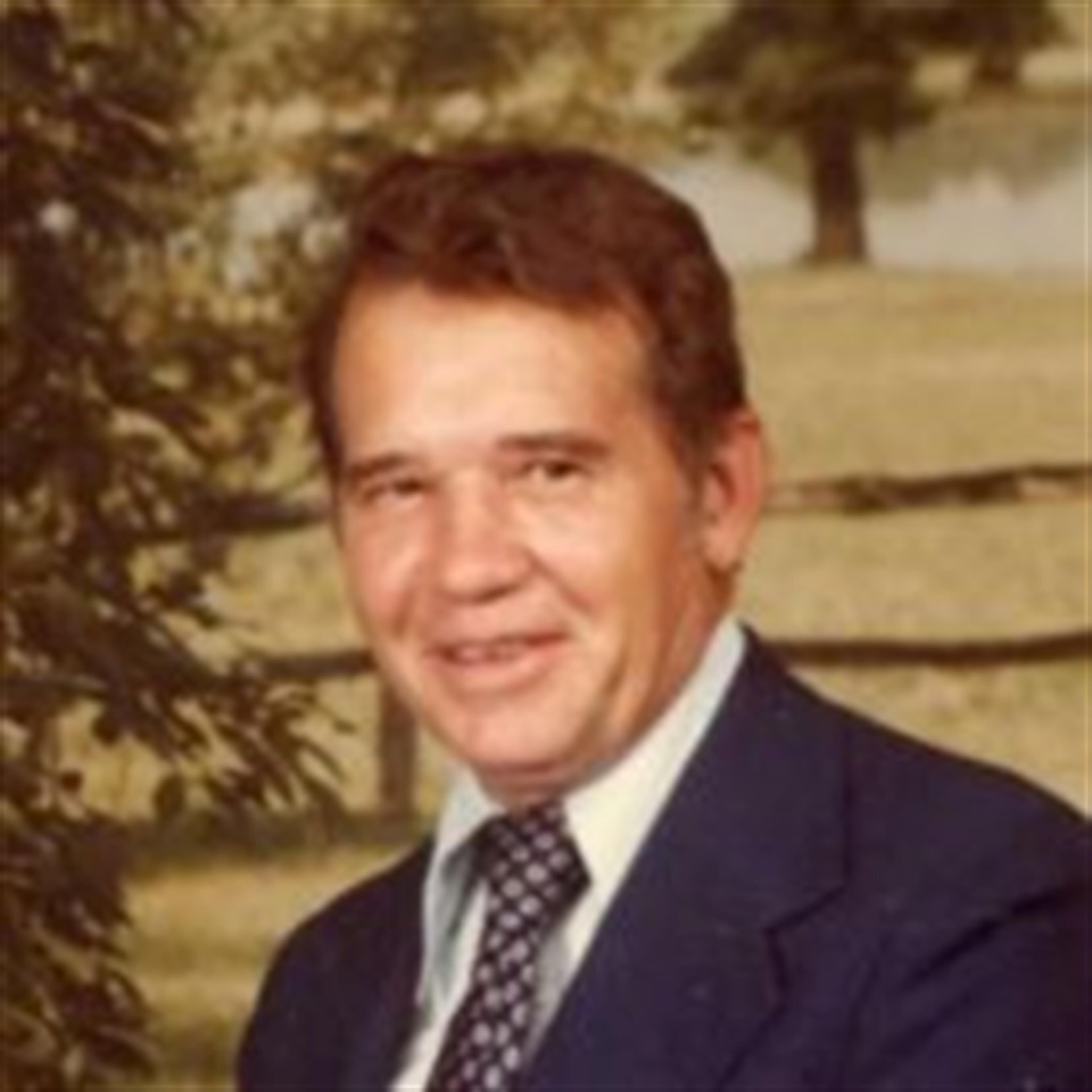 Dr. Charles J. Rey