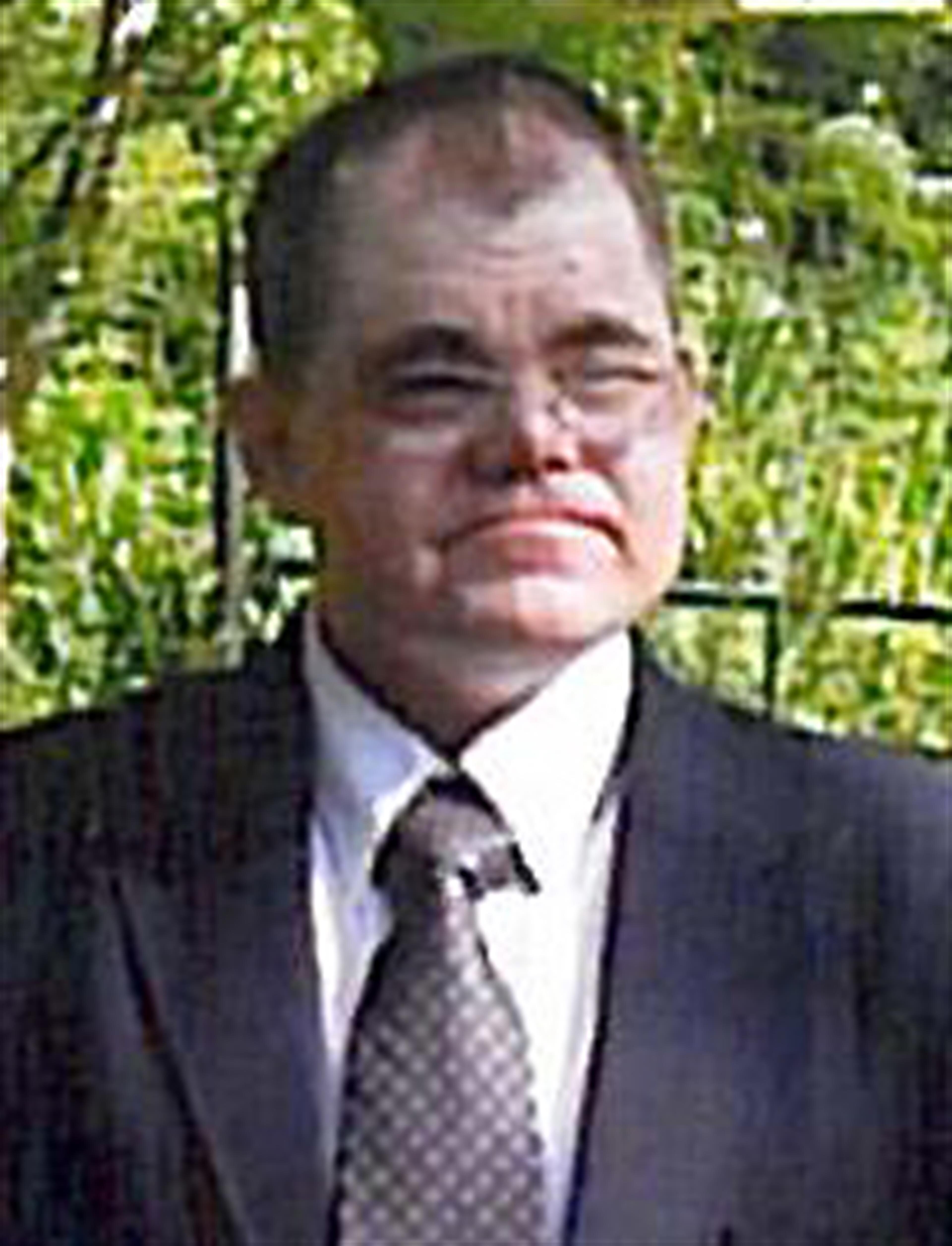 Troy R. Holiday