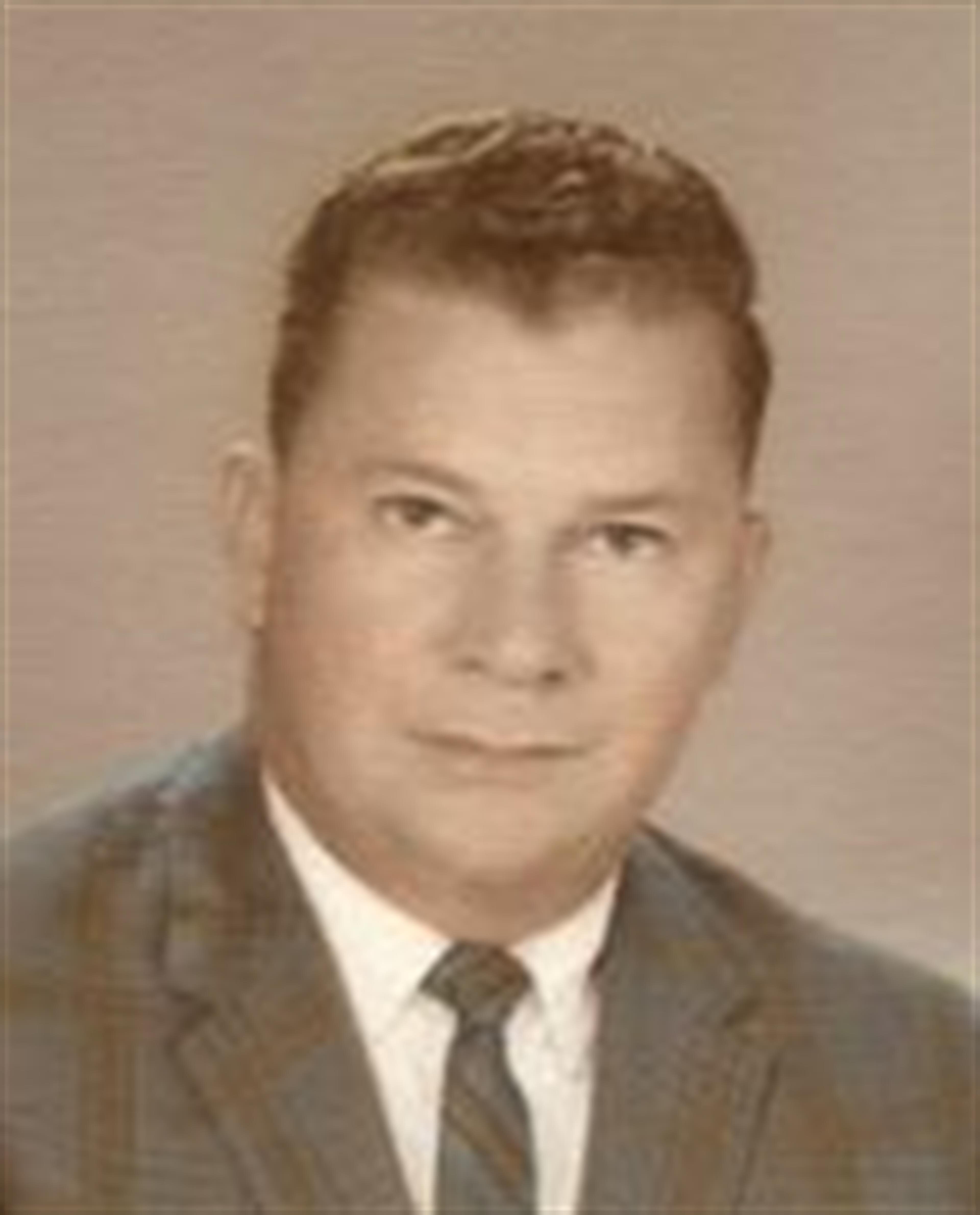 Julian L. Miller
