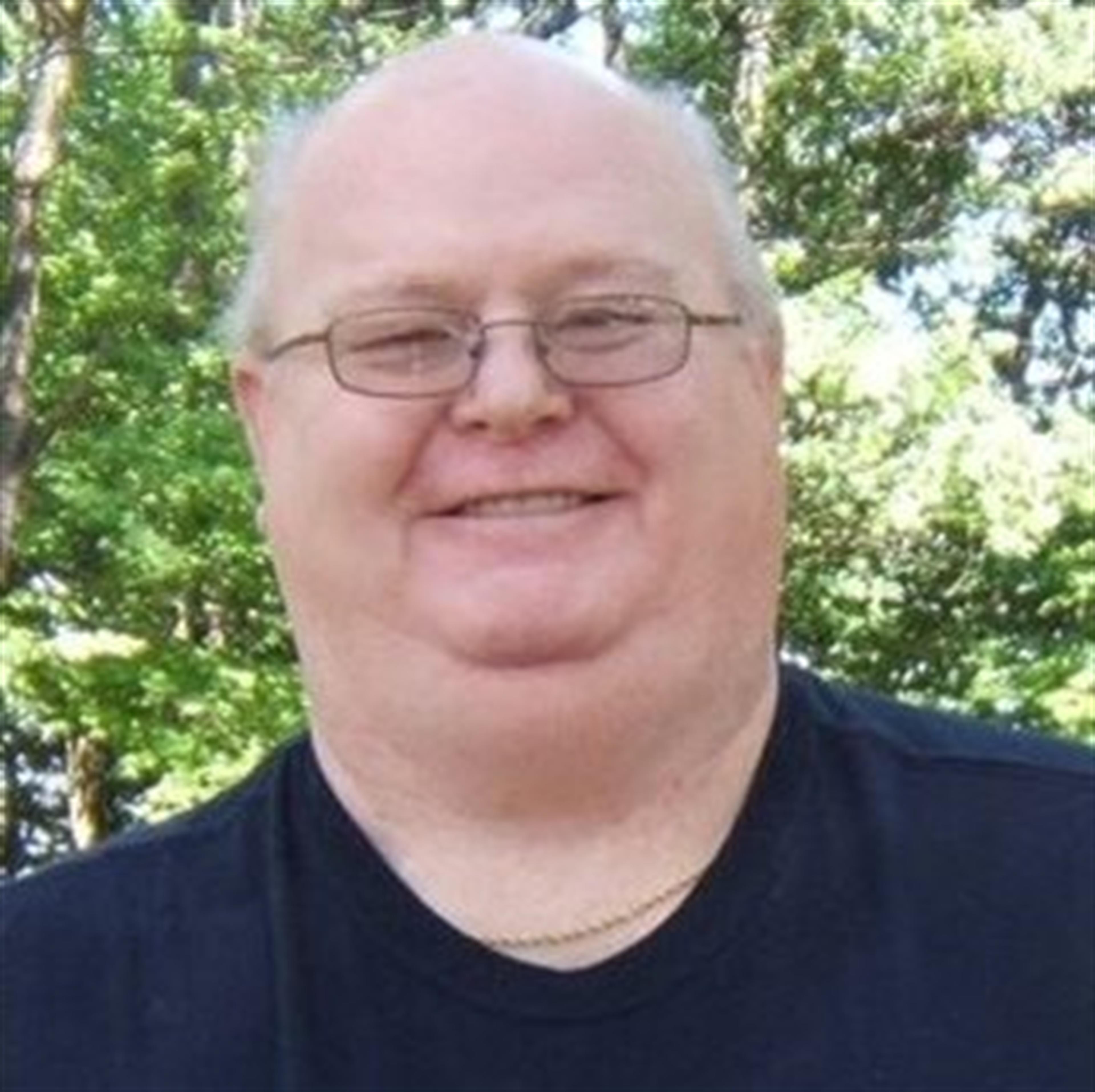 Mr. Larry E.  Wilson