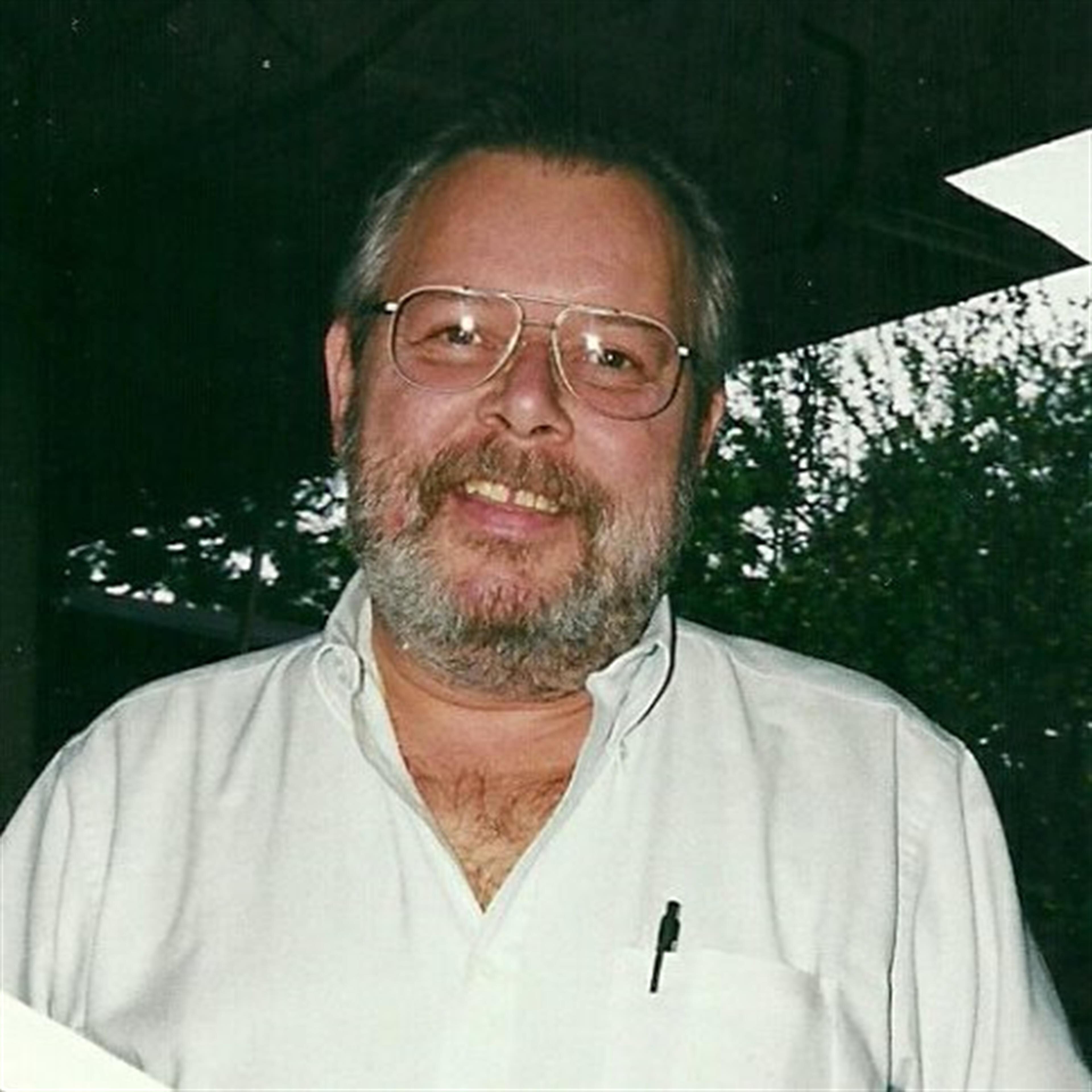 Glenn E.  Brewer