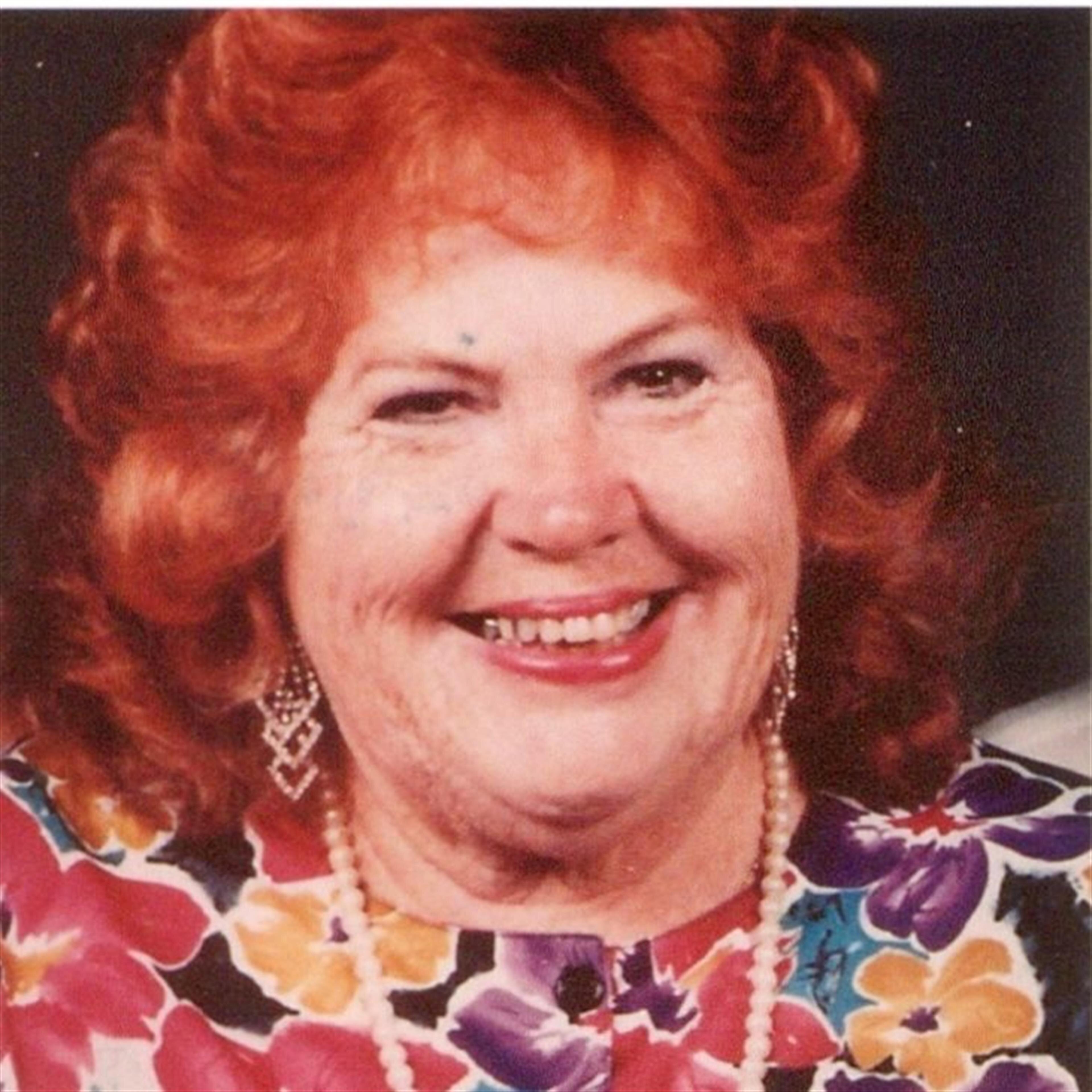 NINA E. WARE