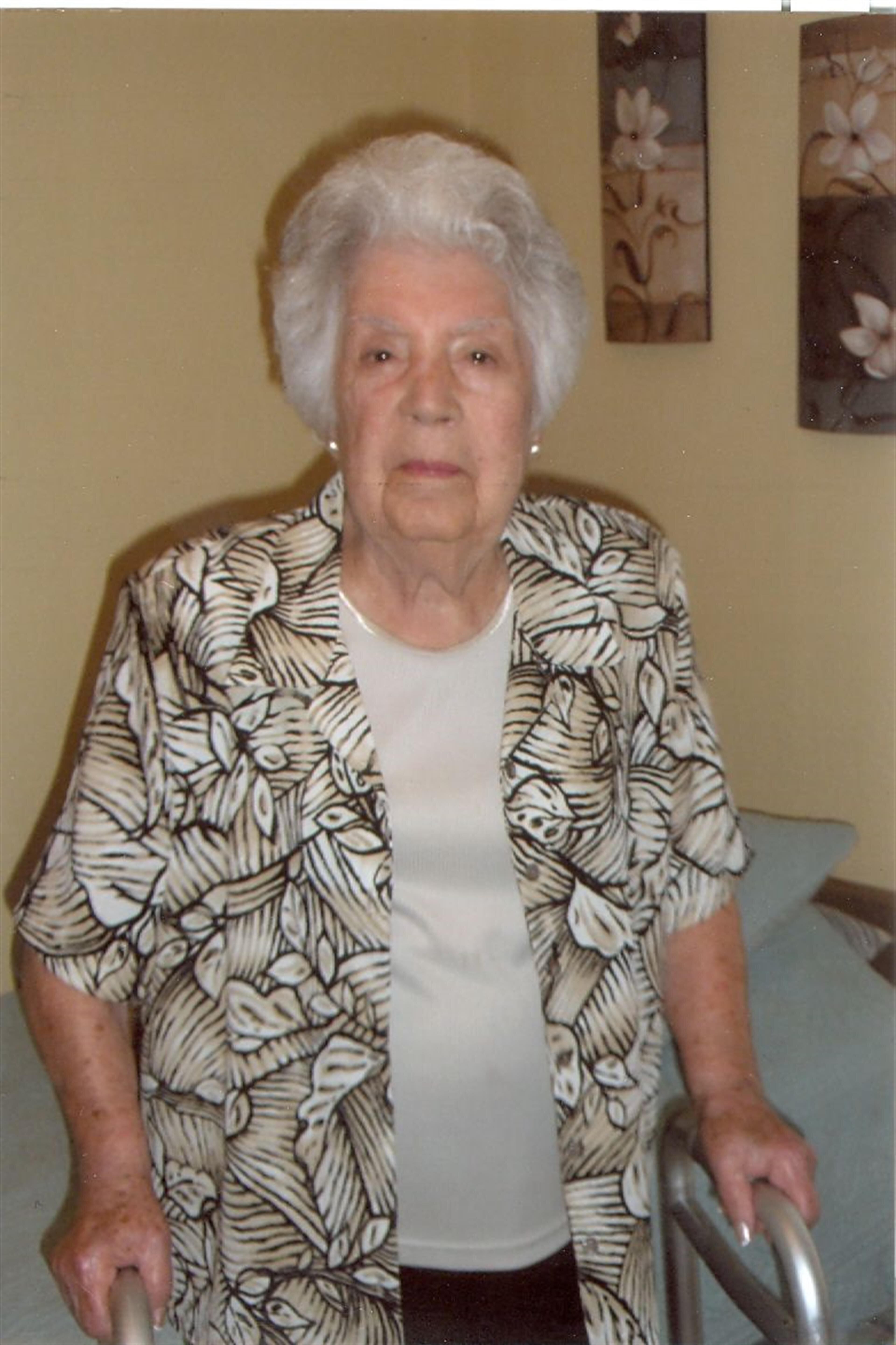 Mrs. Elisa Menendez