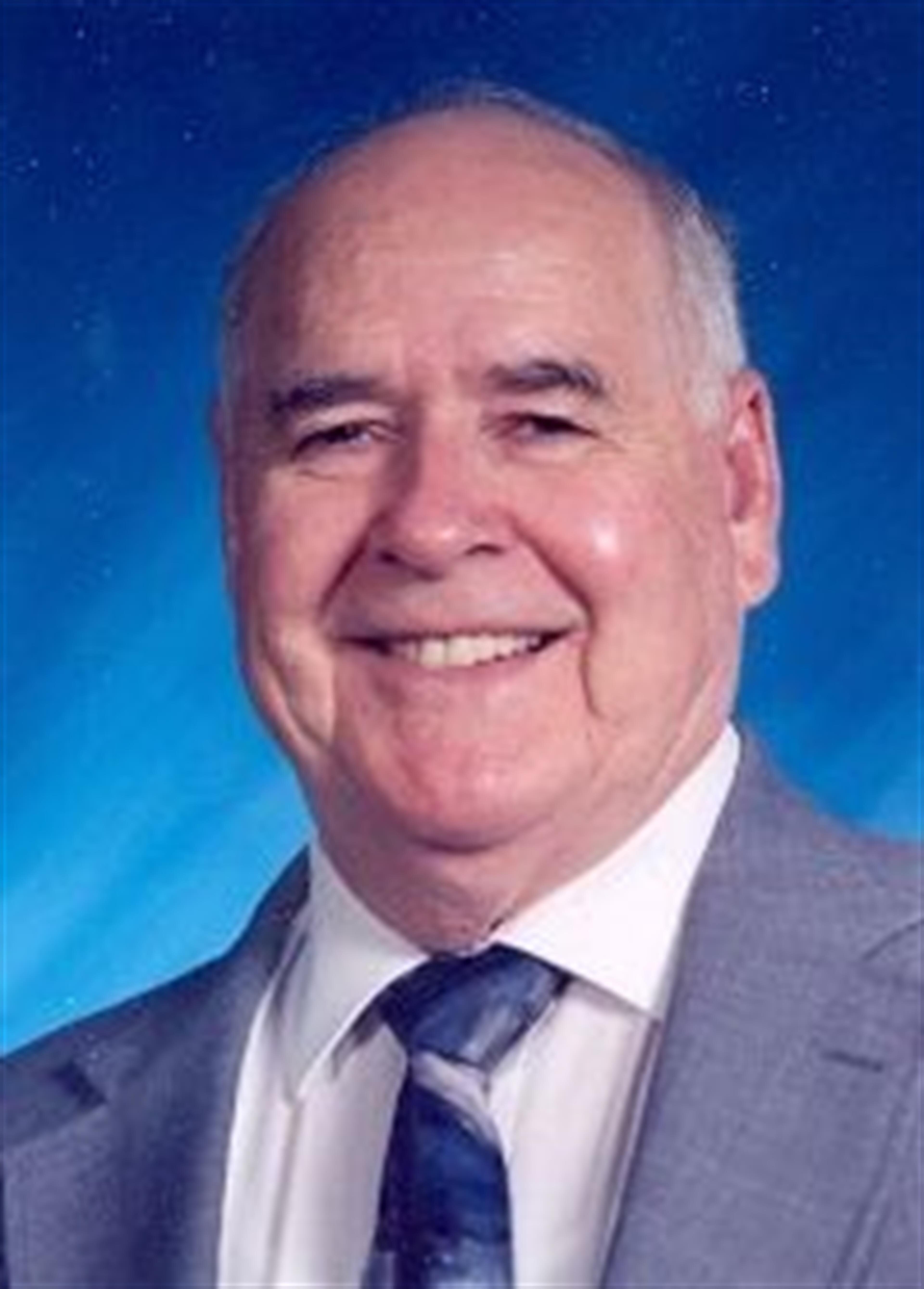 Mr John D Sims