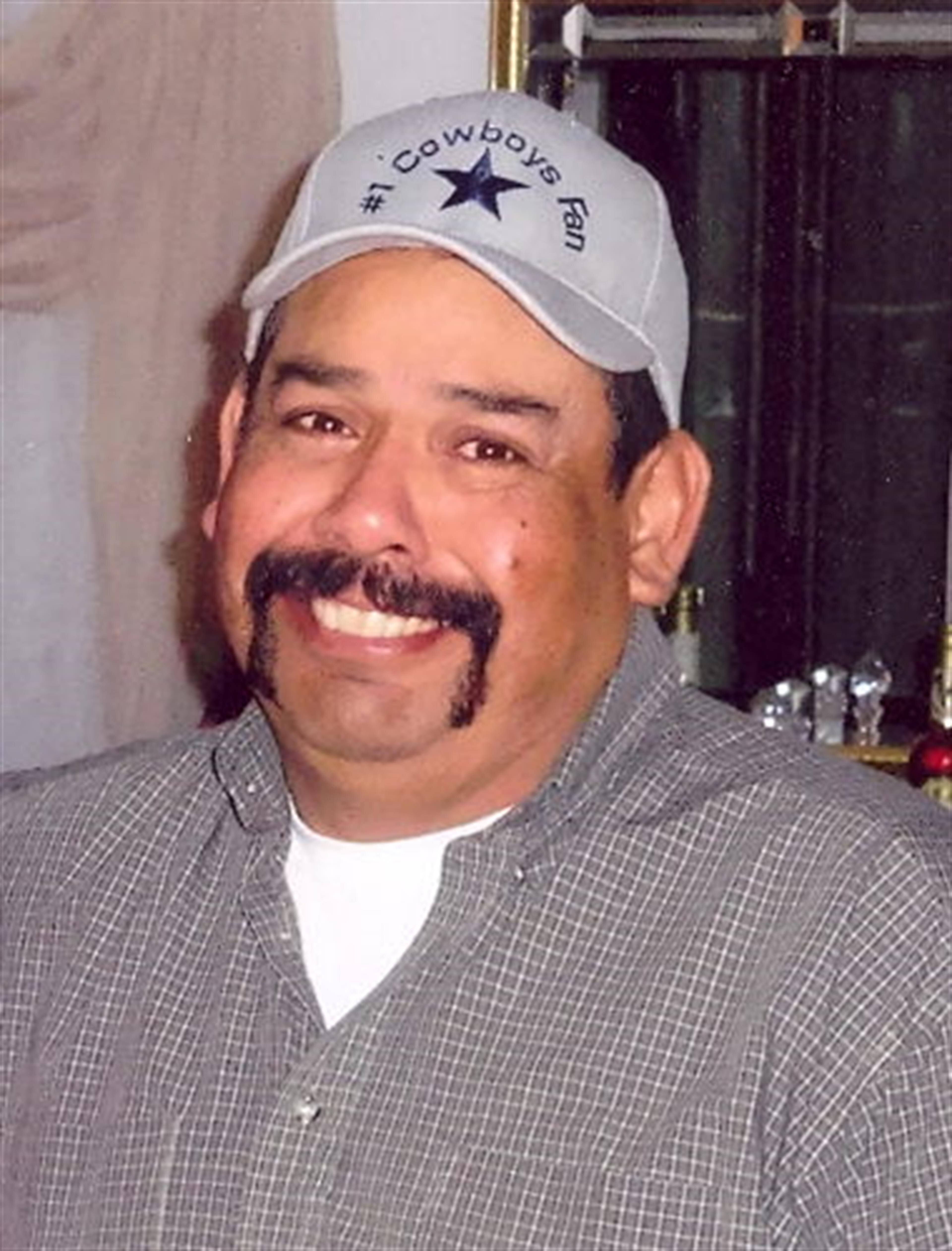 Mr. Guadalupe "Wally" Vela