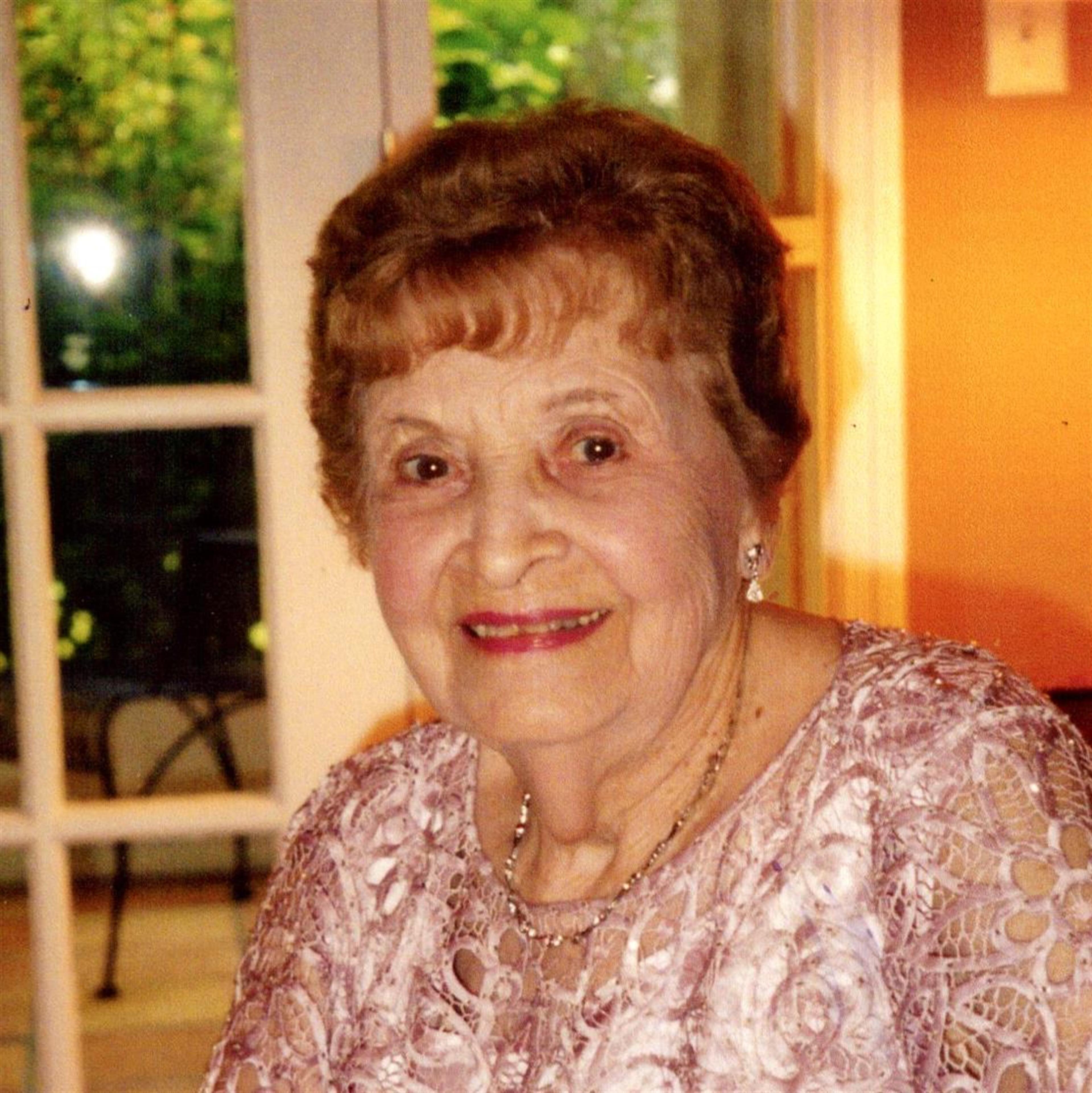 Helen M Melko