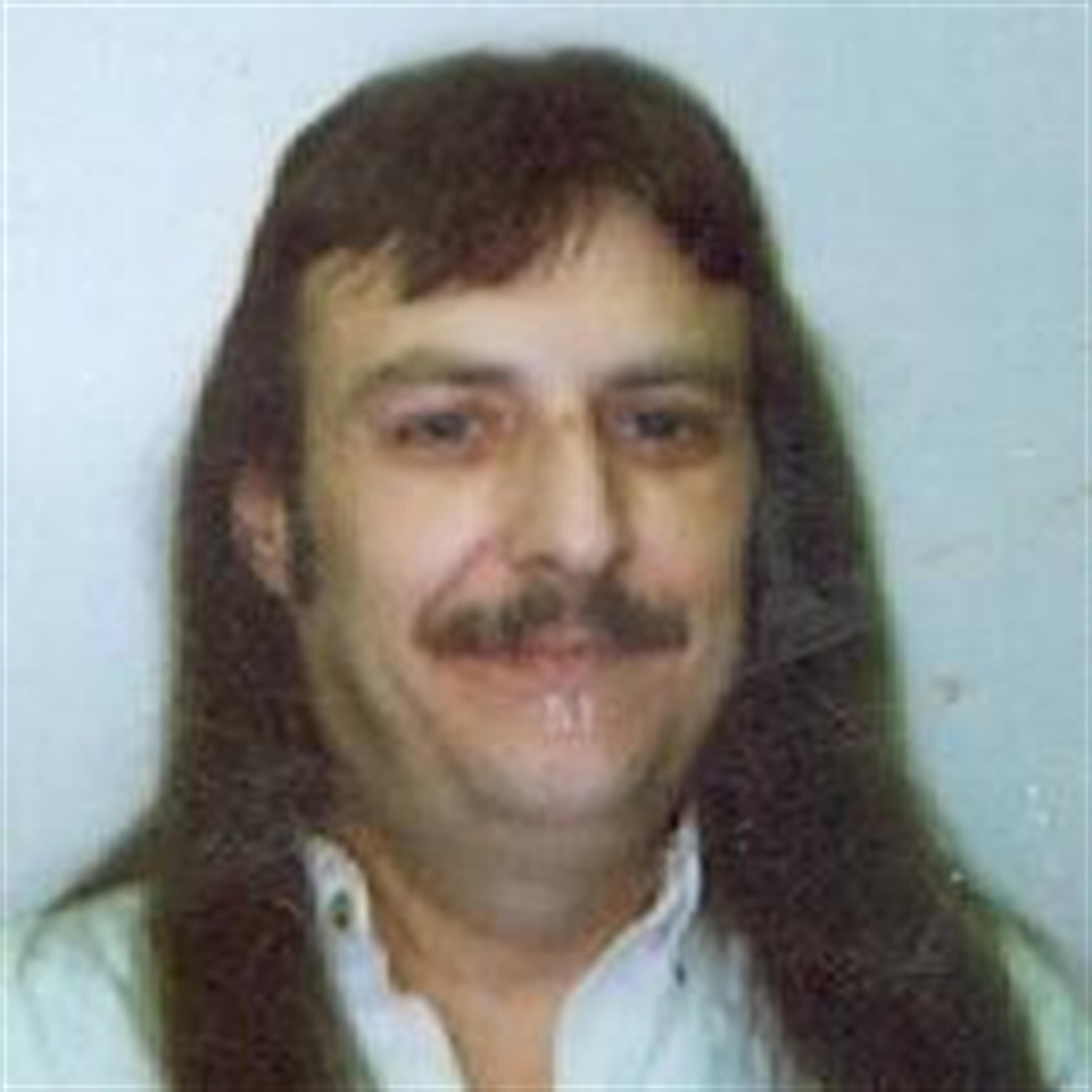 Mr.  Roger David  Carlisle