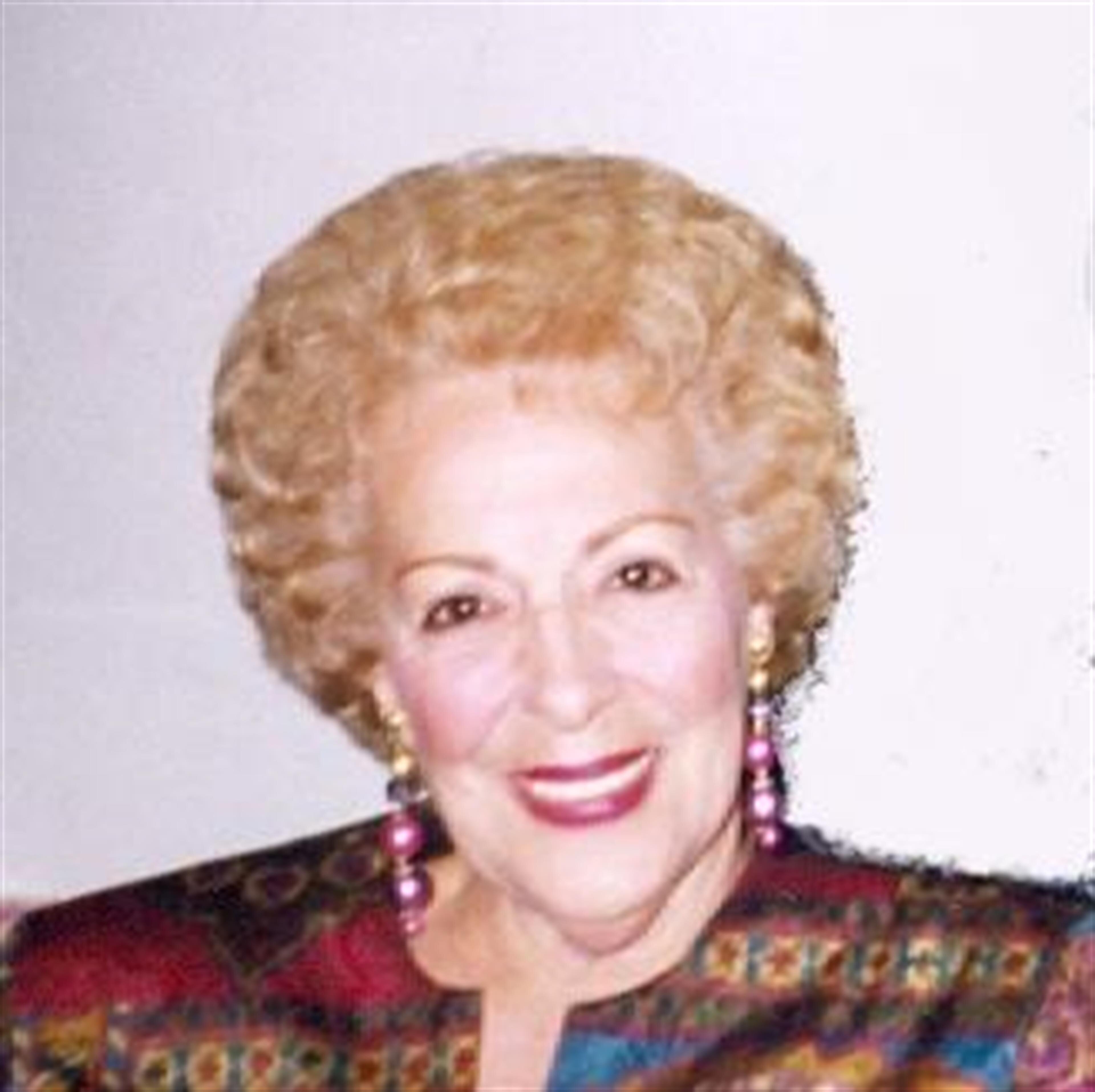 Dora L Frisco
