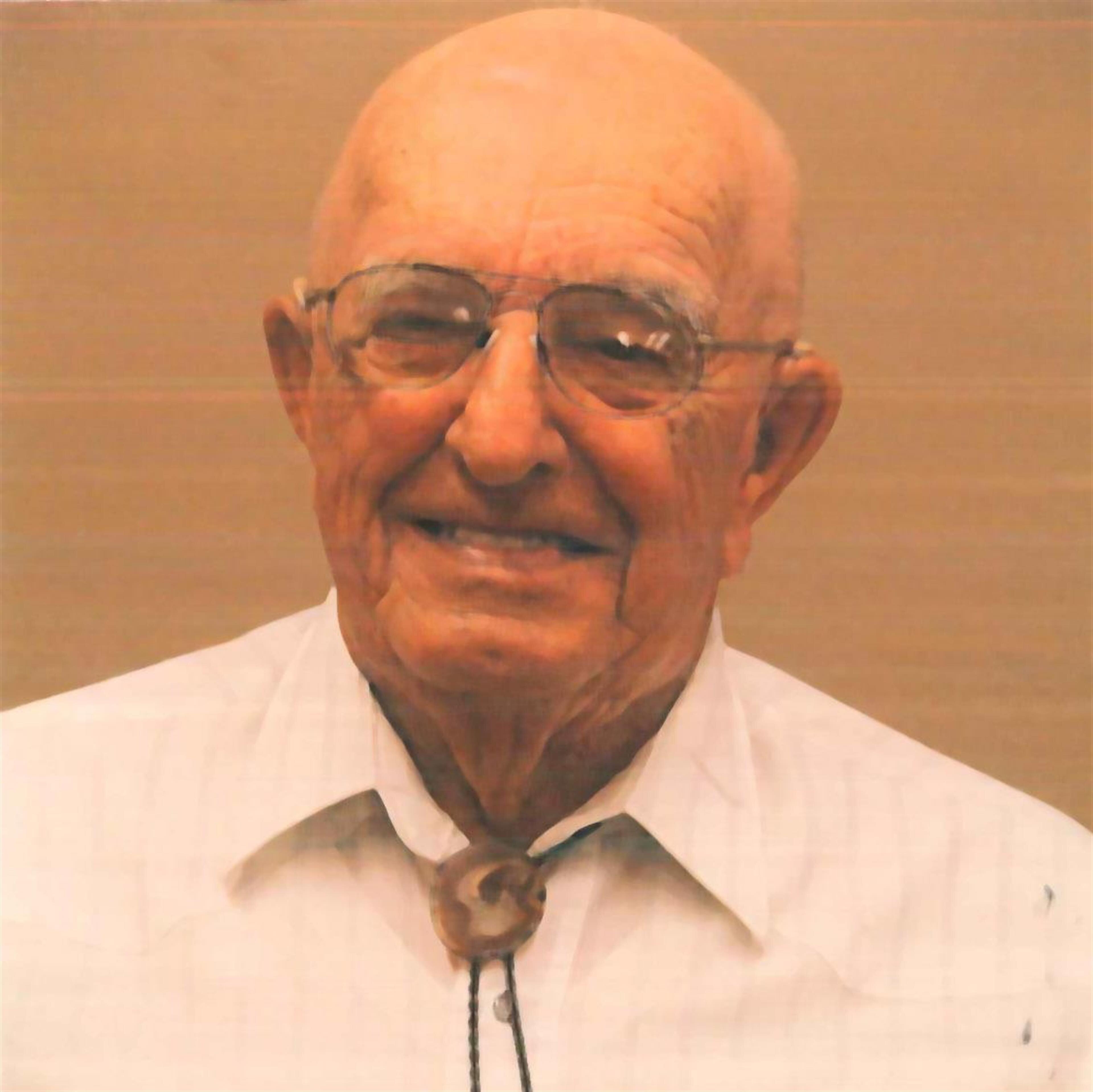 Mark E. MacKinney