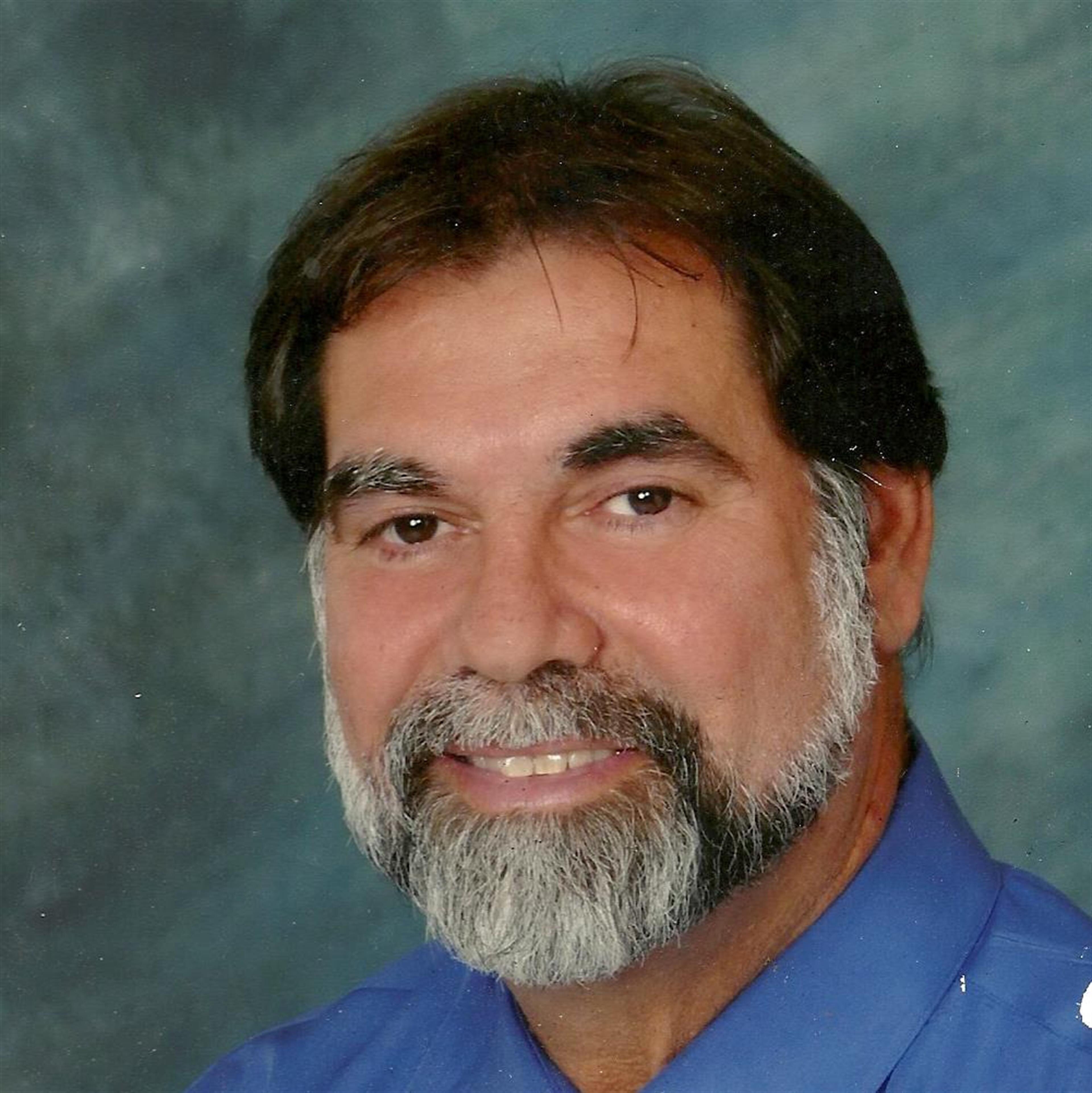 Robert T. "Bob"  Travis