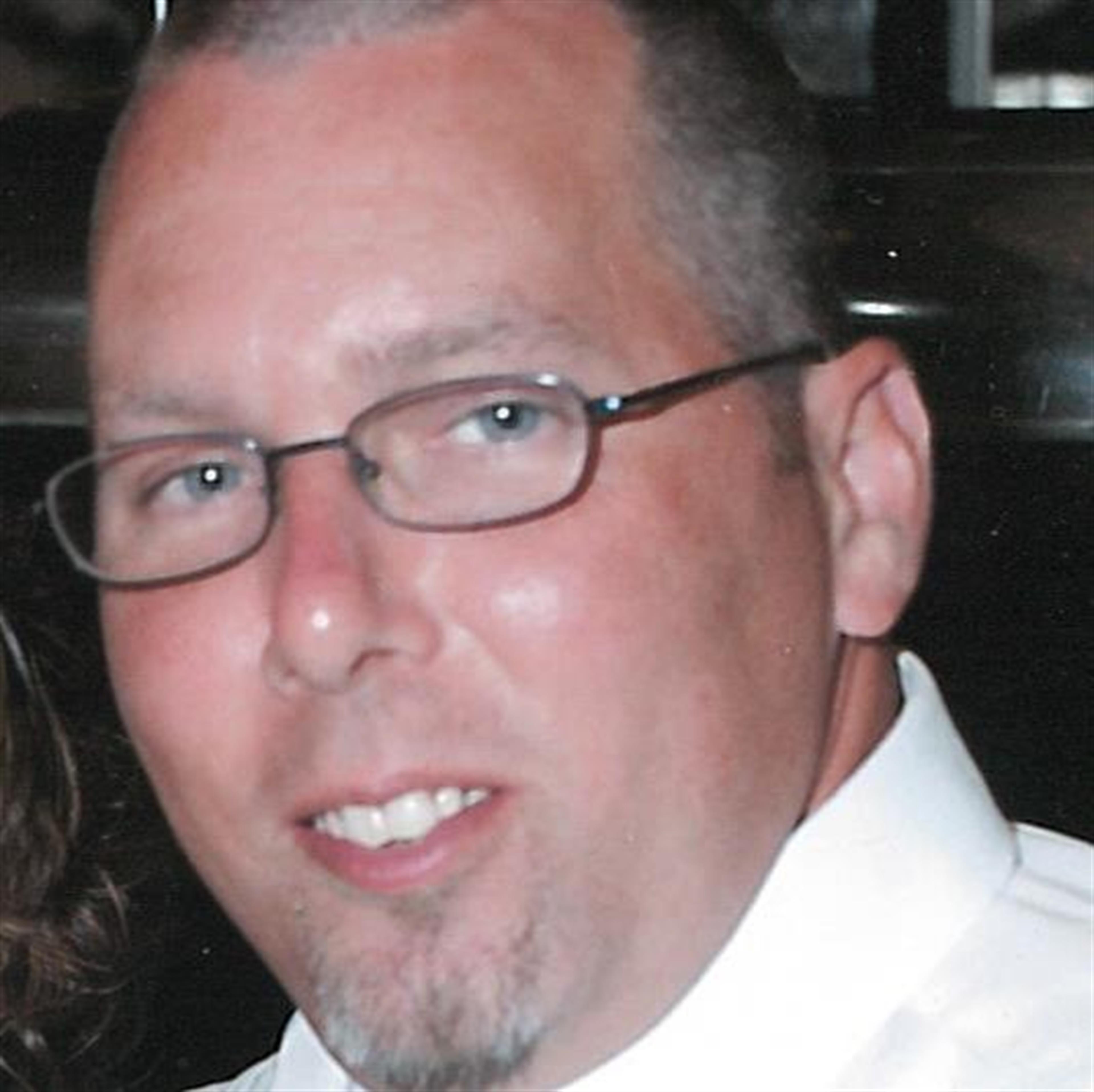 Mark E. "Magoo" Wallace