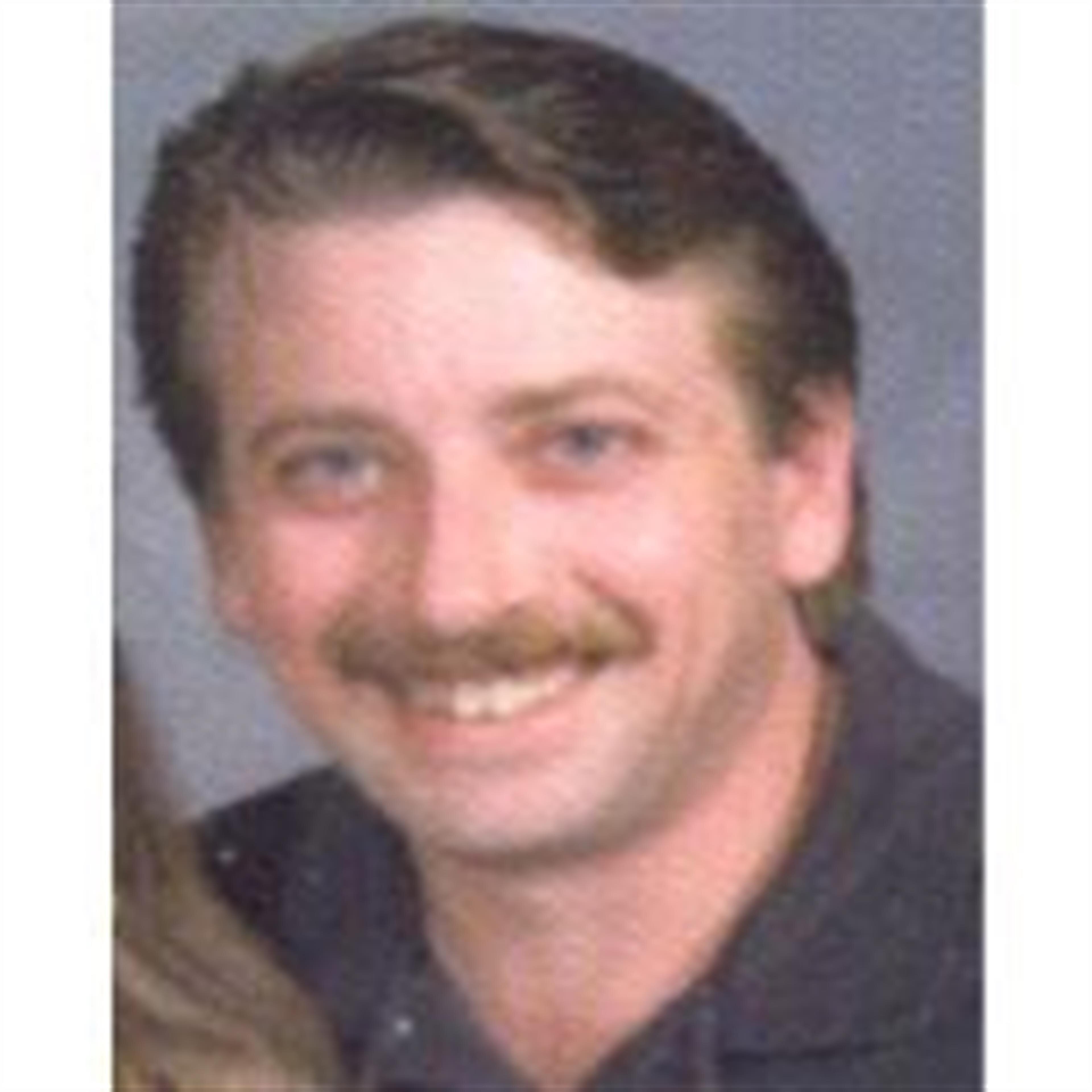 Michael E. George
