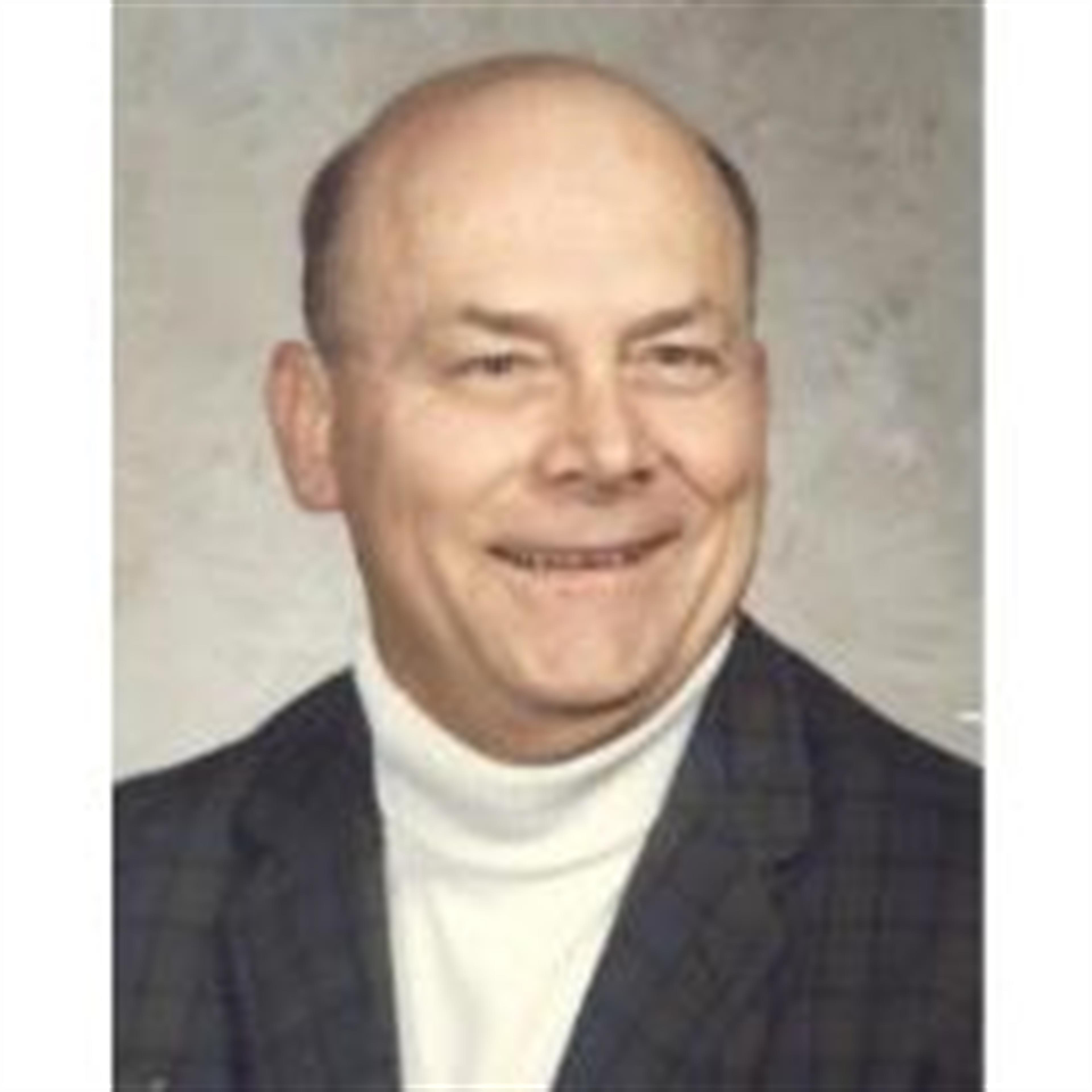 Mr. Mark D. Strate