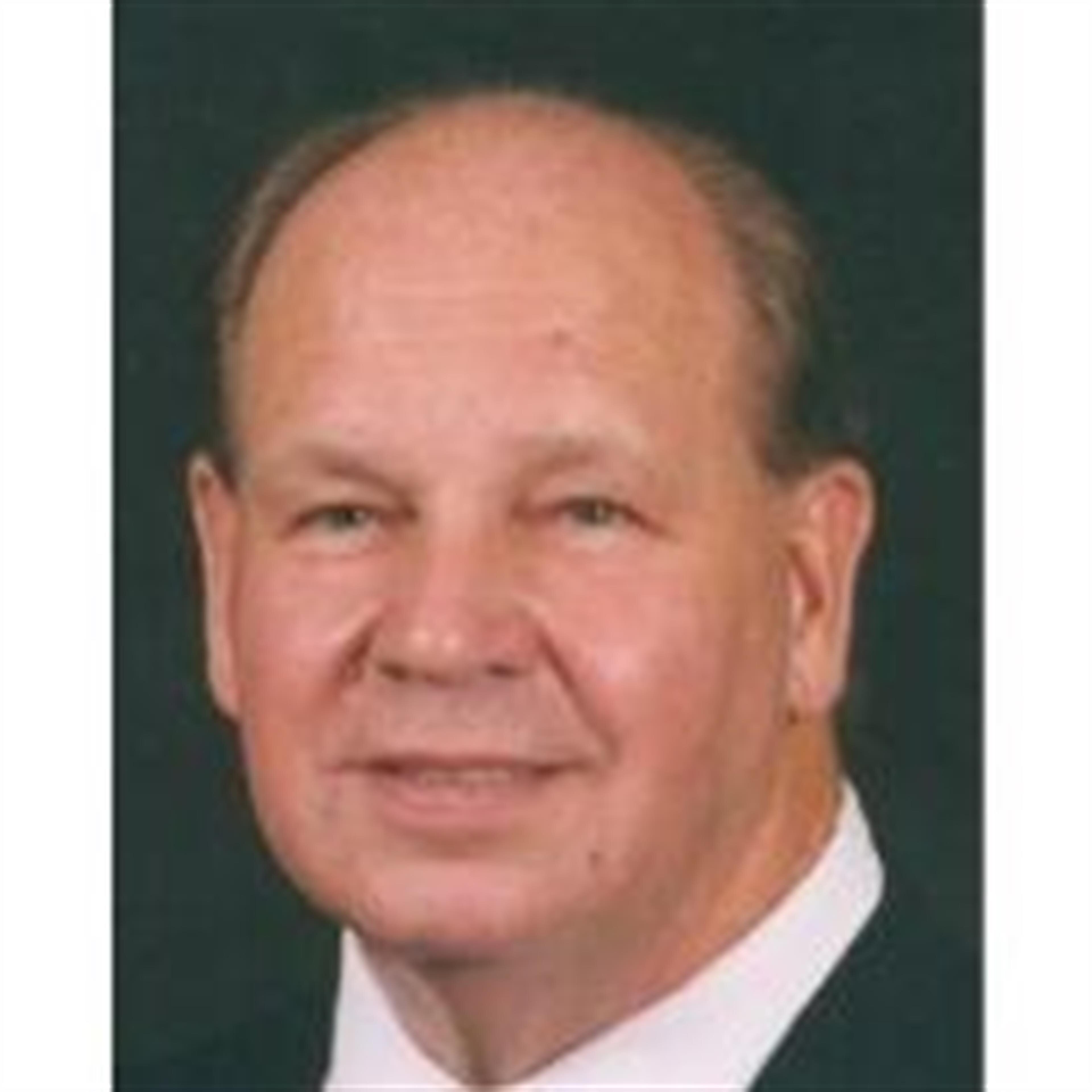 James E.  Dexter