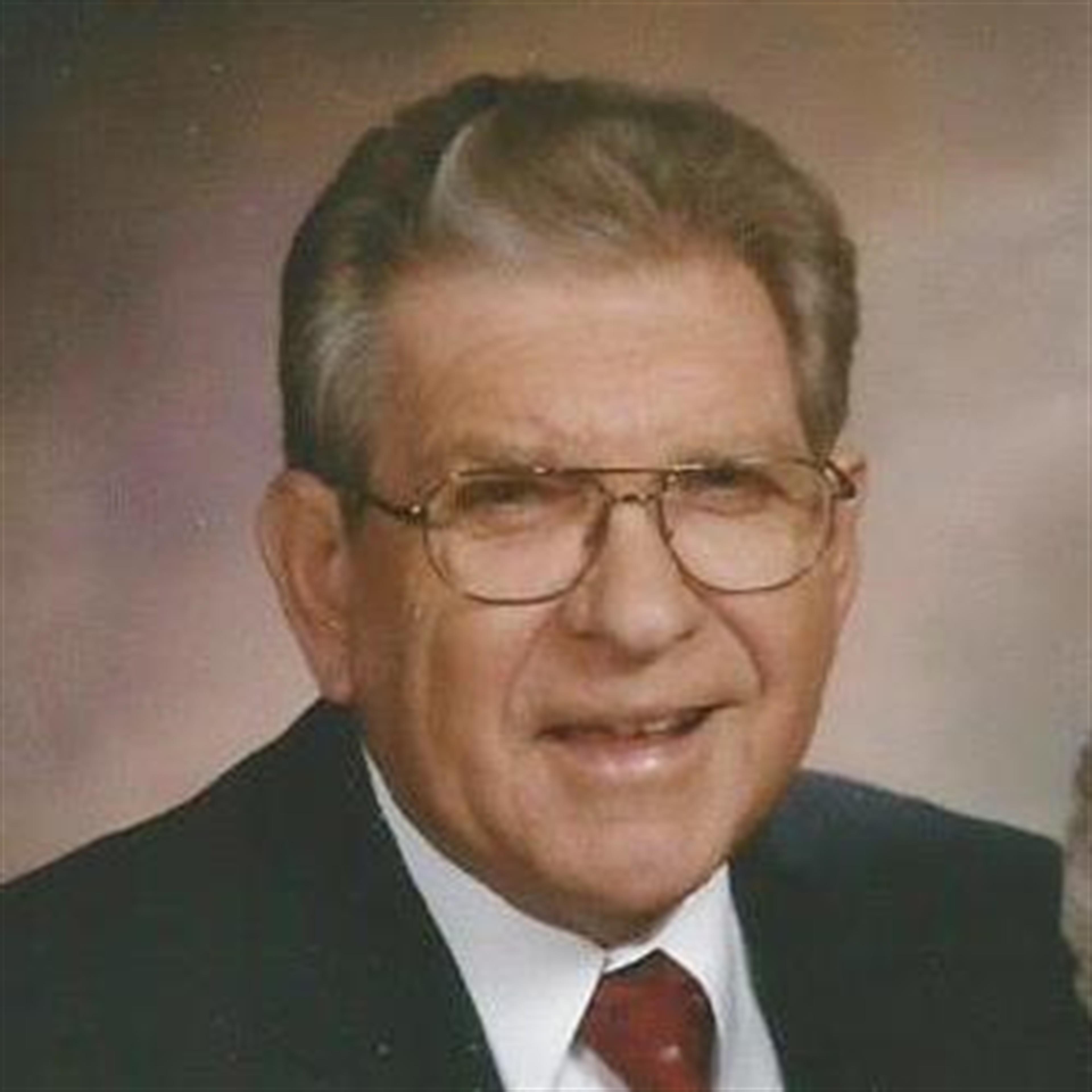 James "Jim" L. Comstock, Minister