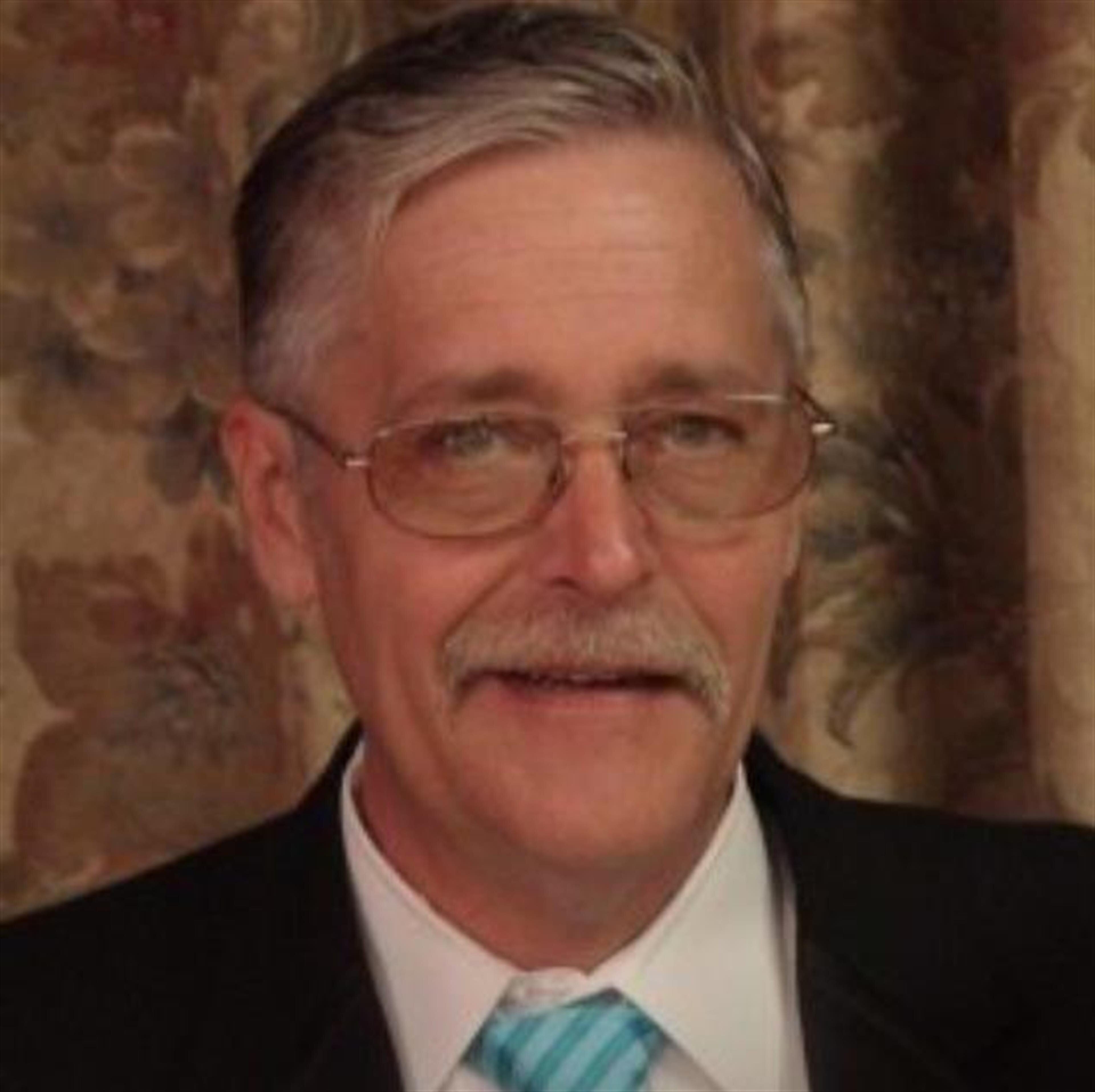 Richard J. "Ric" DeYoung
