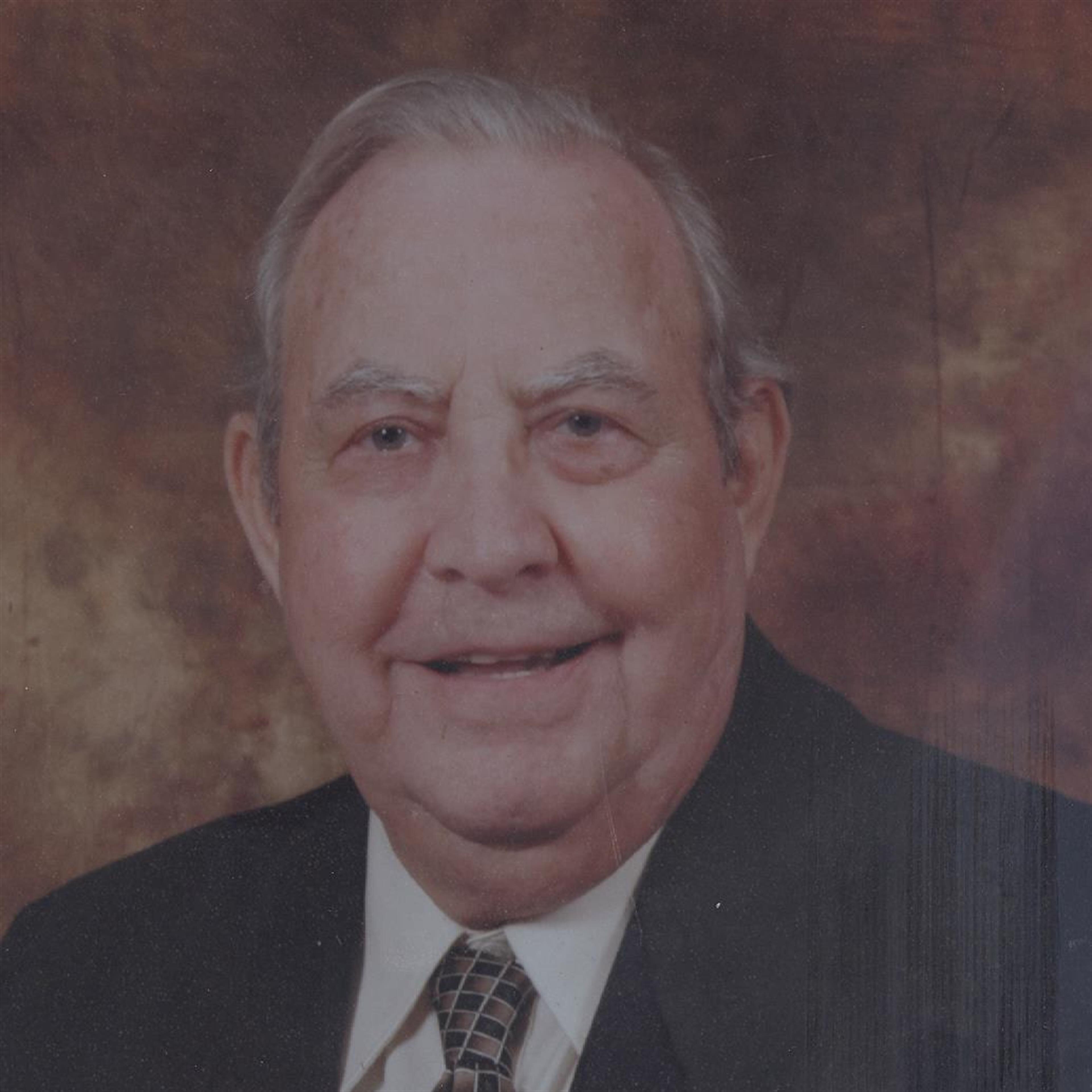 George E Glicos