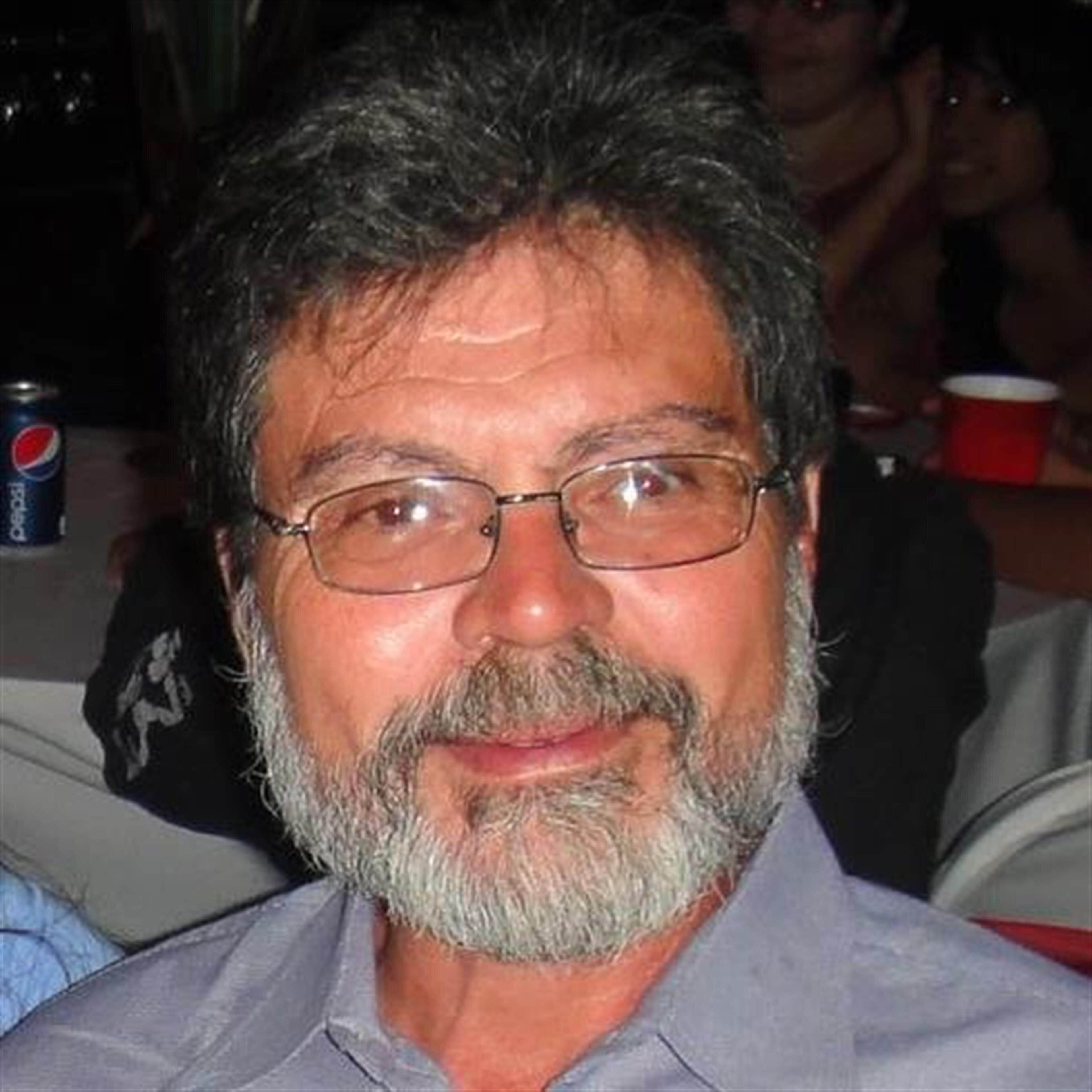 ROBERT E. SAHLAND